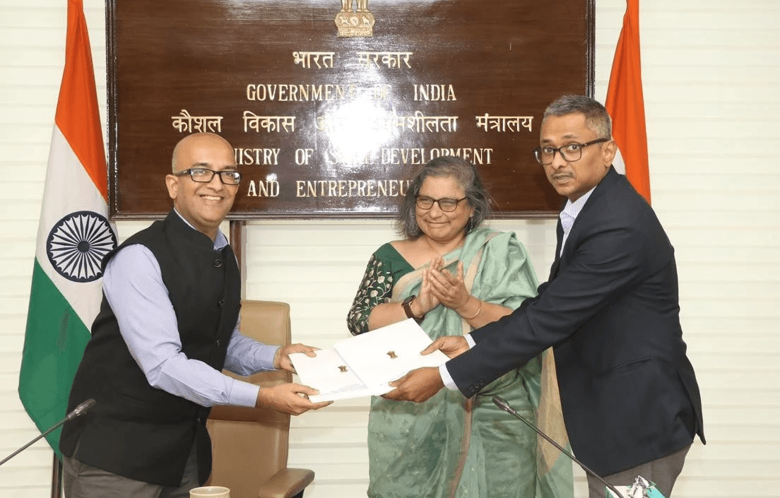 people sitting in front of table talking and eating