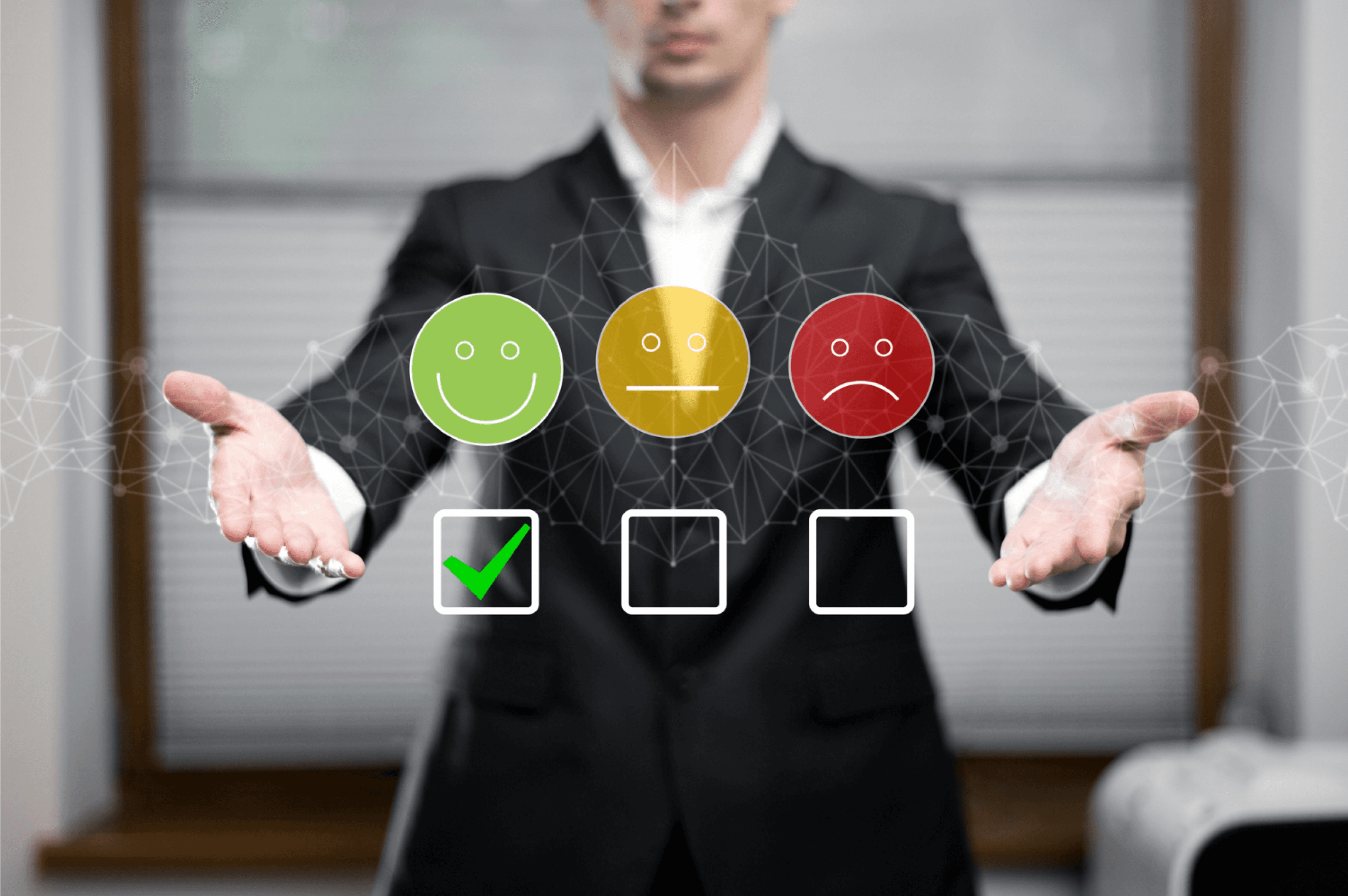 Businessman in suit choosing a green happy face icon on a virtual customer feedback interface