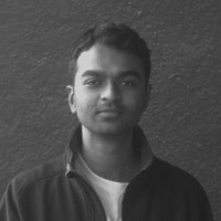 man in gray suit jacket