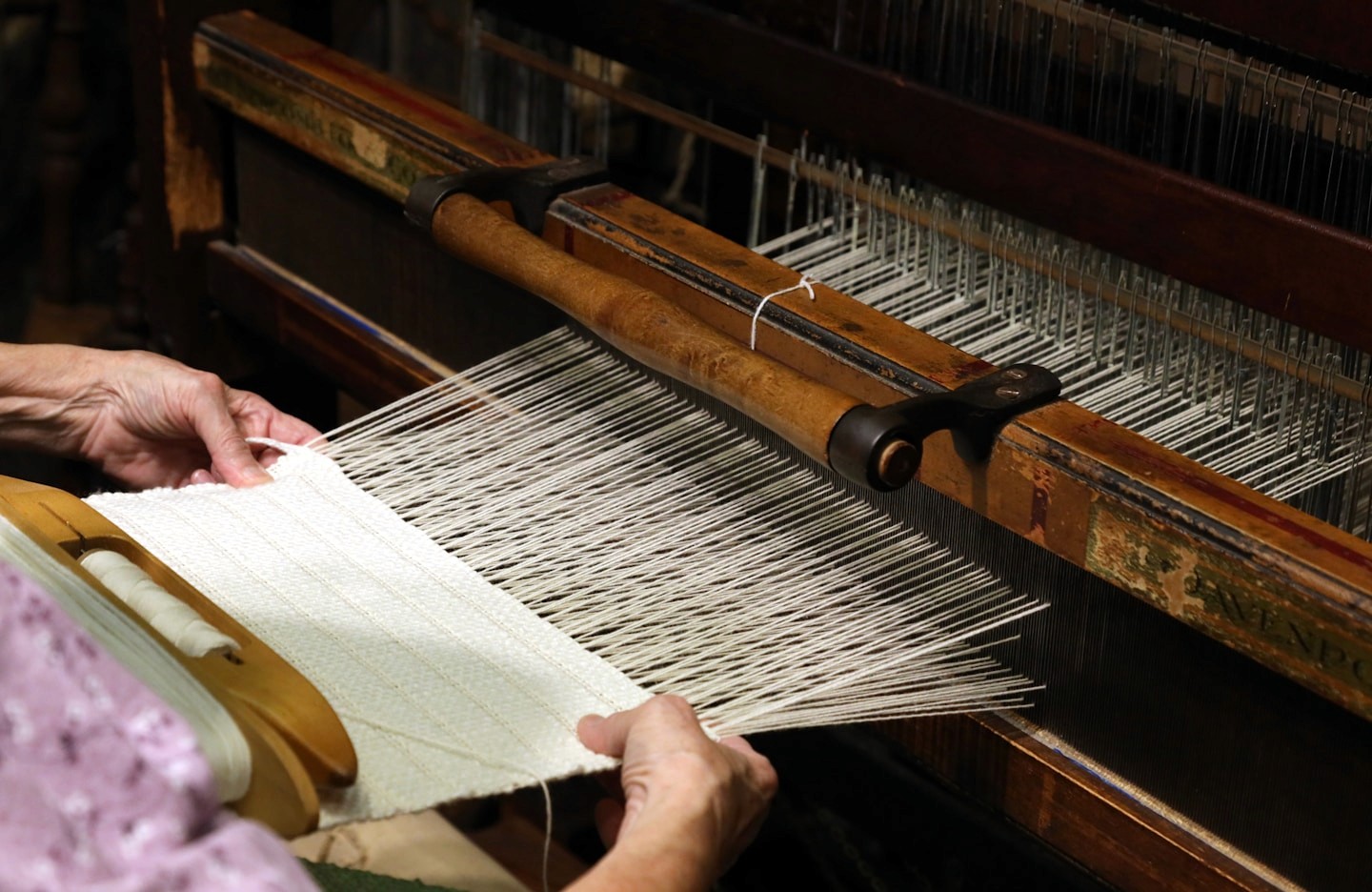 Cloth coming off the loom with the selvedge intact