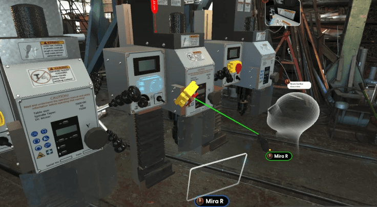 Two users review industrial equipment in virtual reality