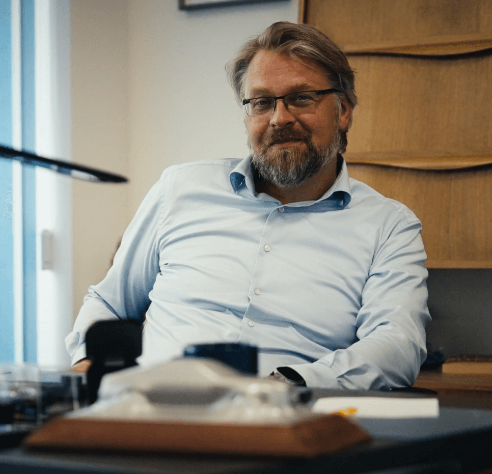 CEO Christoph Sieber leading a strategy meeting for automotive design and innovation partnership.