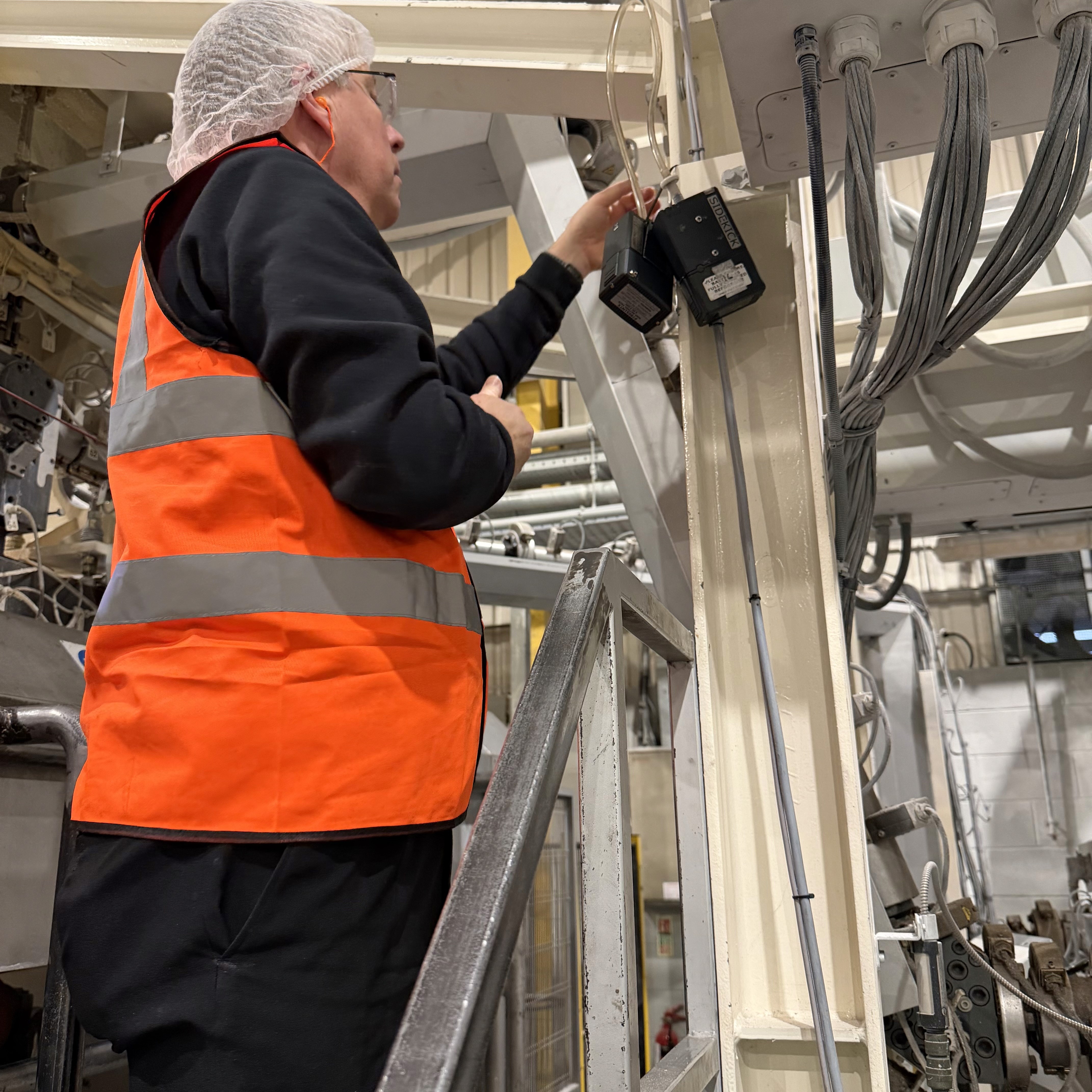 Occupational hygienist conducting solvent vapour monitoring