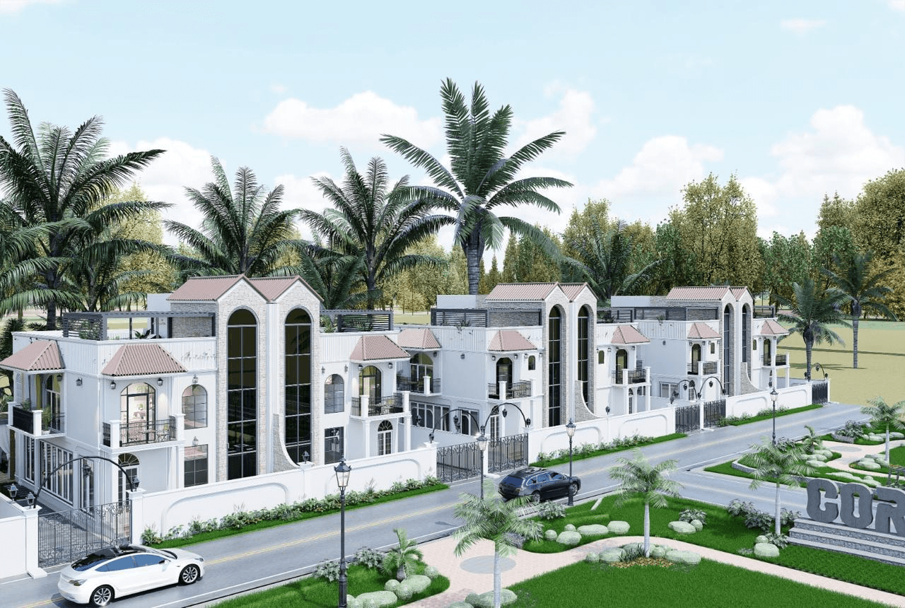Single-story house with a terracotta-tiled roof, archway entrance, plants in the yard, and a paved driveway. Bright, sunny day, tropical vibe.