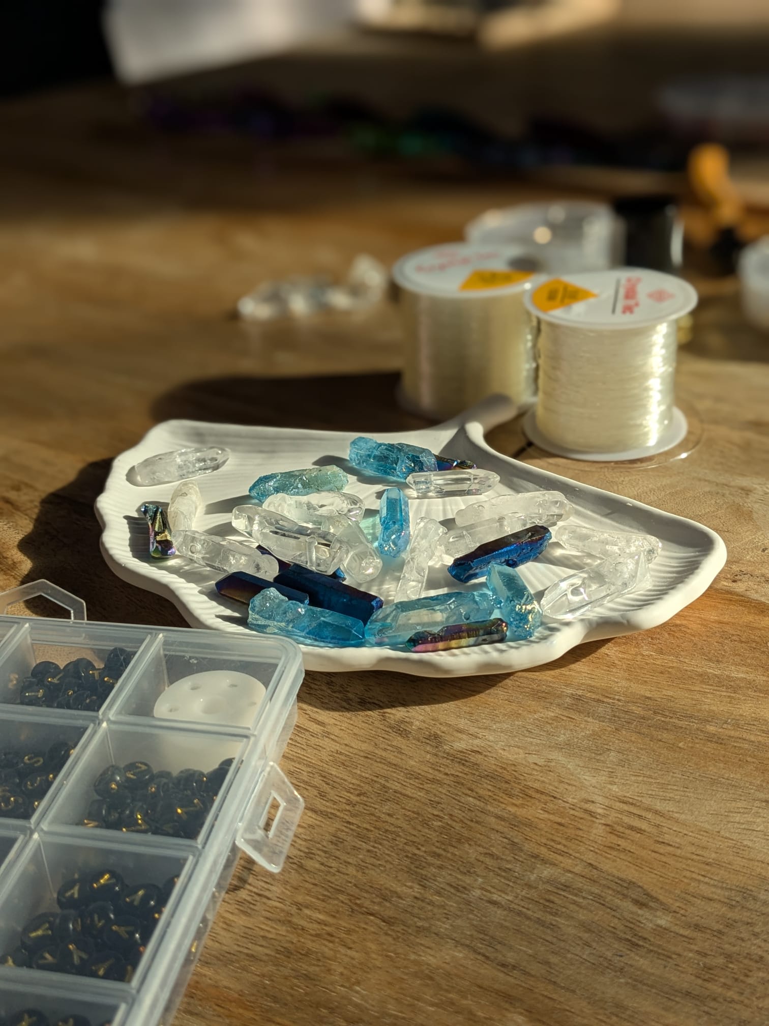 A luxurious indoor pool area with a panoramic view of a city at sunset. Comfortable lounge beds with soft fabrics surround the pool, while warm ambient lighting enhances the sophisticated atmosphere. The space combines modern elegance with a tranquil vibe.