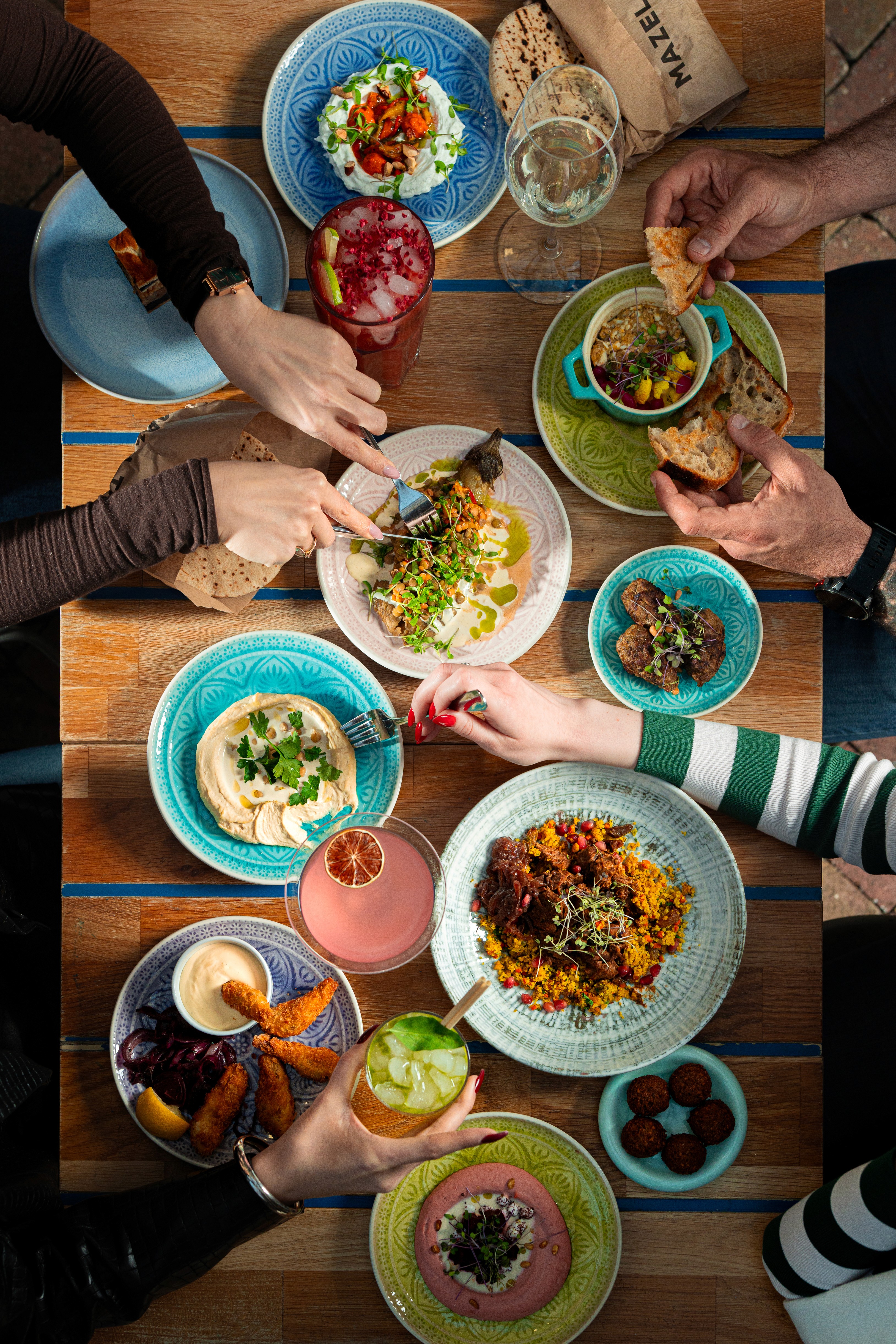 Colorful mezze platter with hummus and vegetables