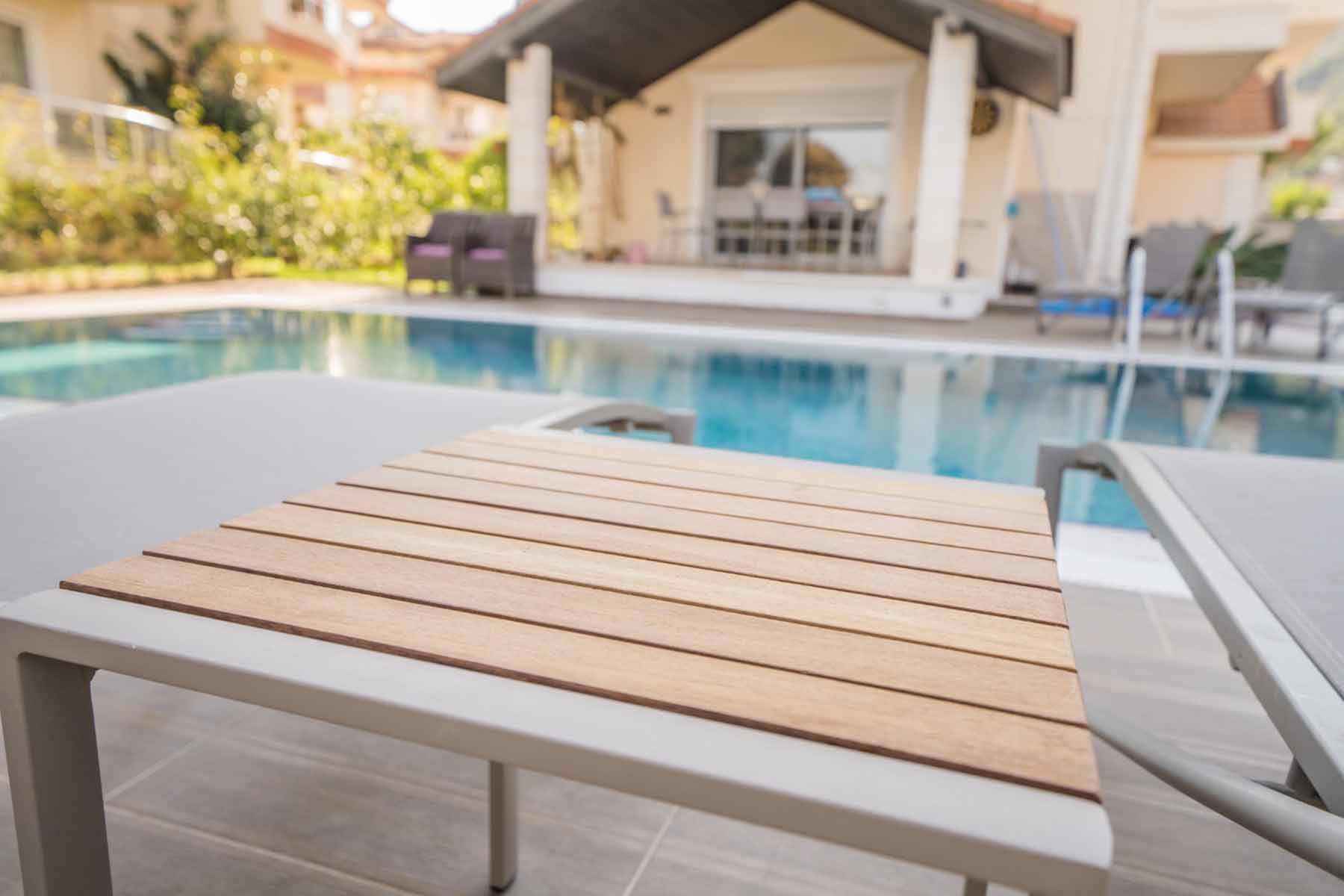 husband and wife working happily on a laptop
