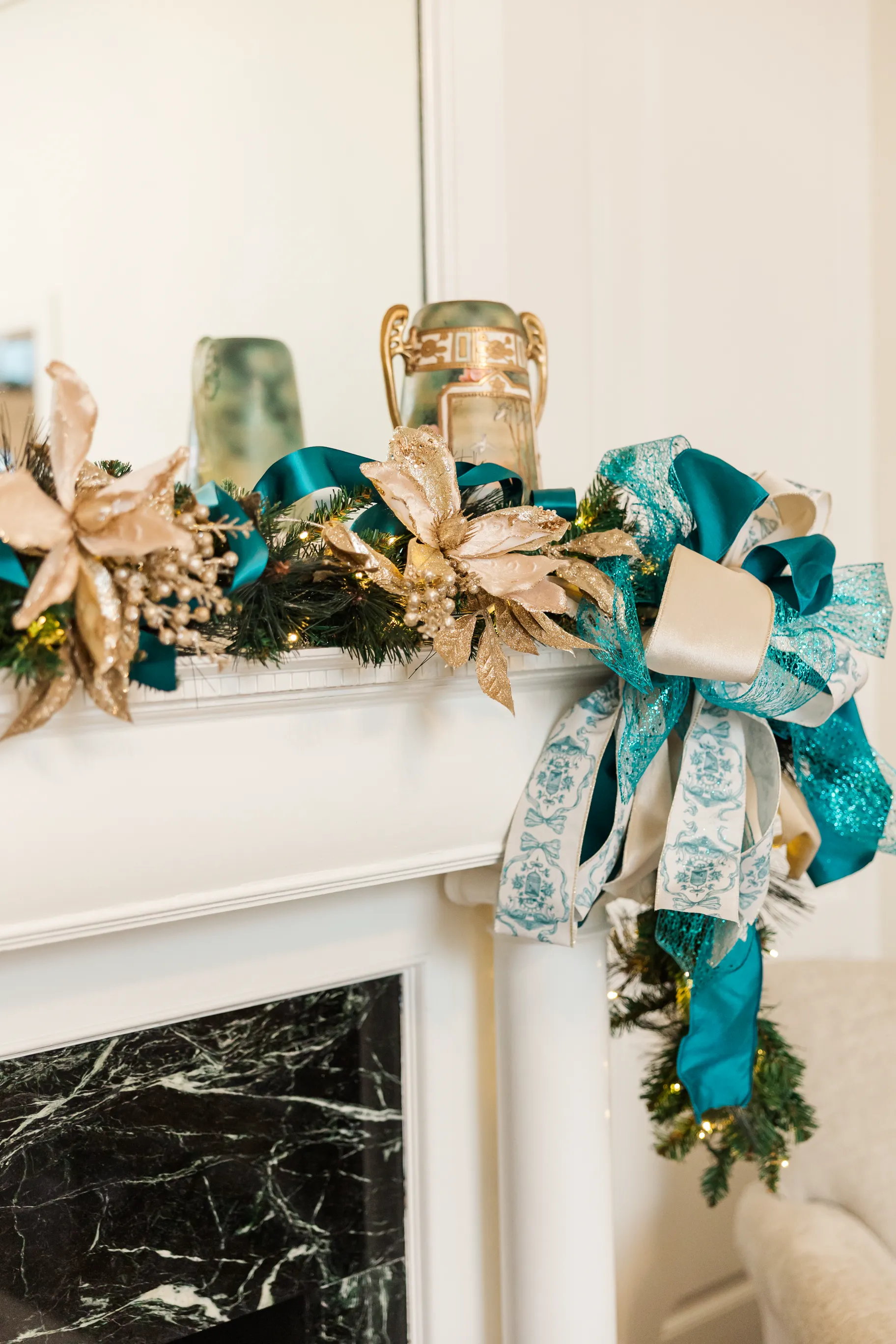 Luxury table setting by Sarah Overall Events with pink embroidered napkins, gold-rimmed plates, floral arrangements, and personalized menus in Shreveport.