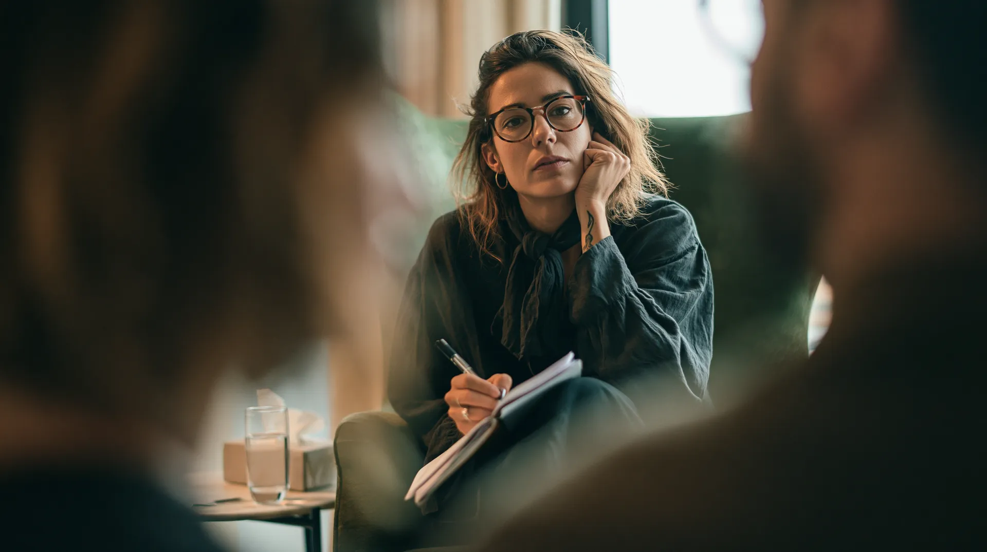 Physician in a one-to-one consultation with a client