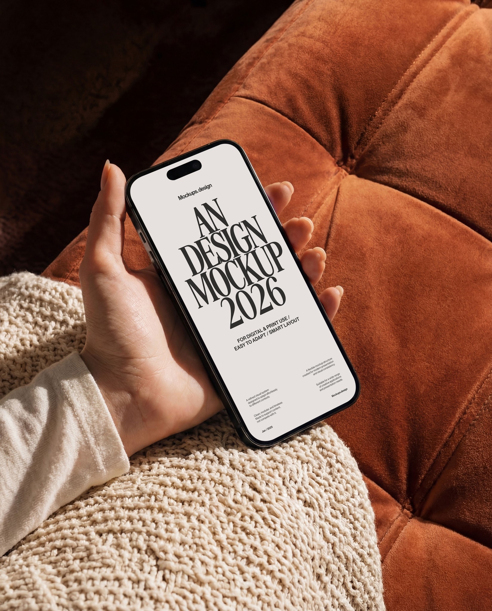 Hand holding iPhone 16 mockup at home, clean interior setting