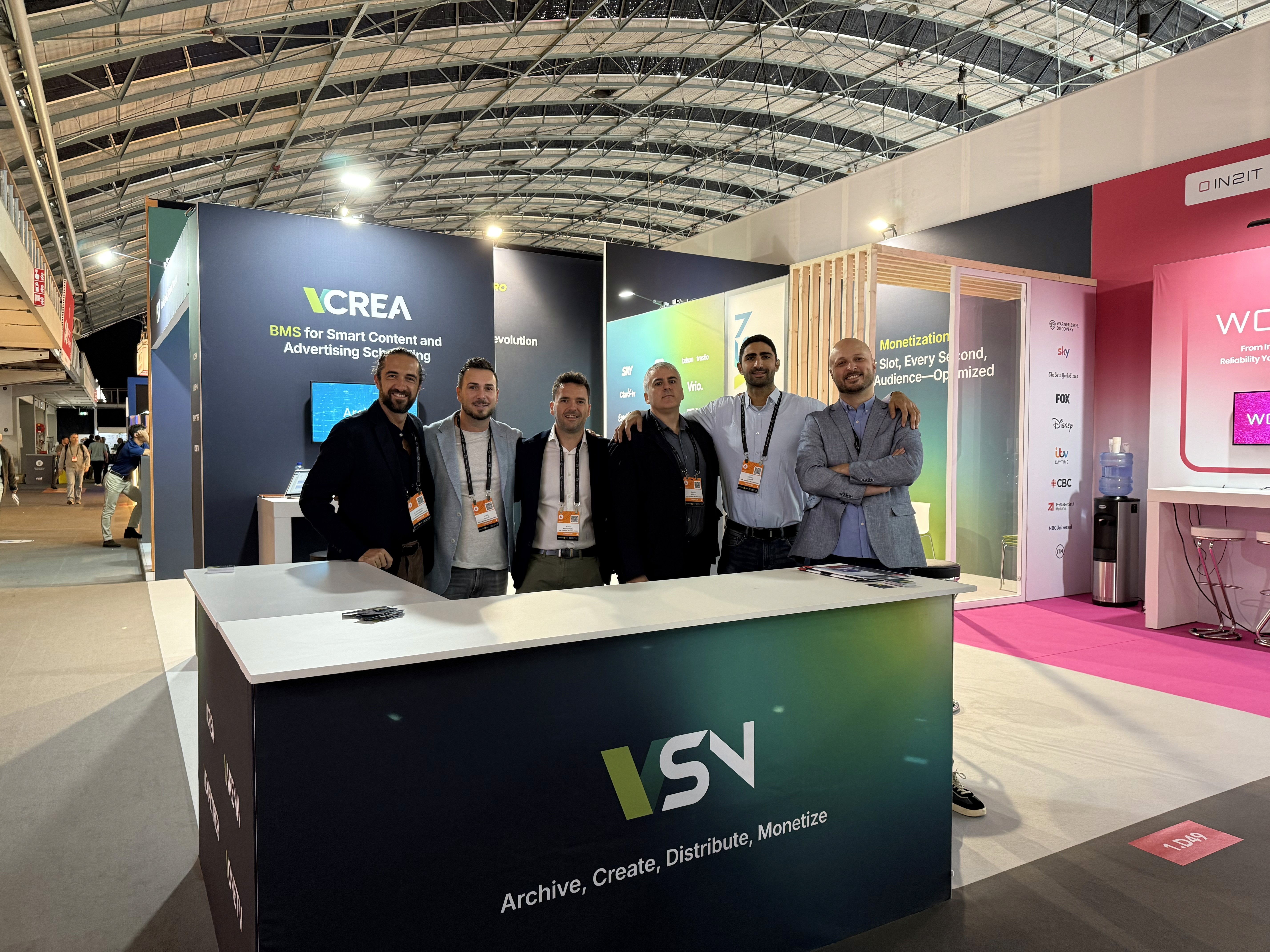 A diverse group of people placing their hands together in a circle, symbolizing unity and collaboration. This represents the human-centric approach at Woody Technologies, where a global team works to develop Woody Vision as the ultimate multi-platform social search engine.