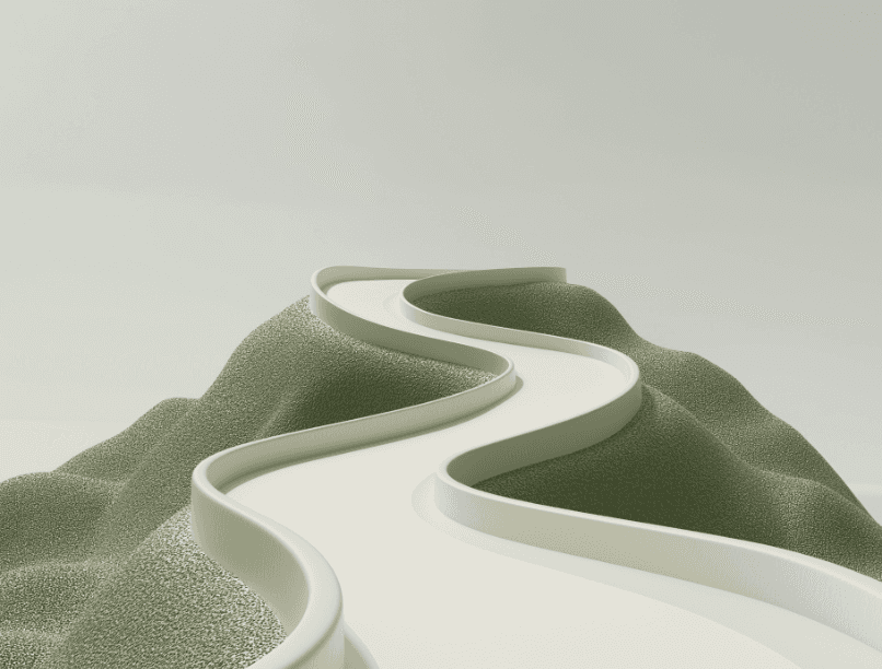 Two men discuss a project while standing at a laptop in an office.