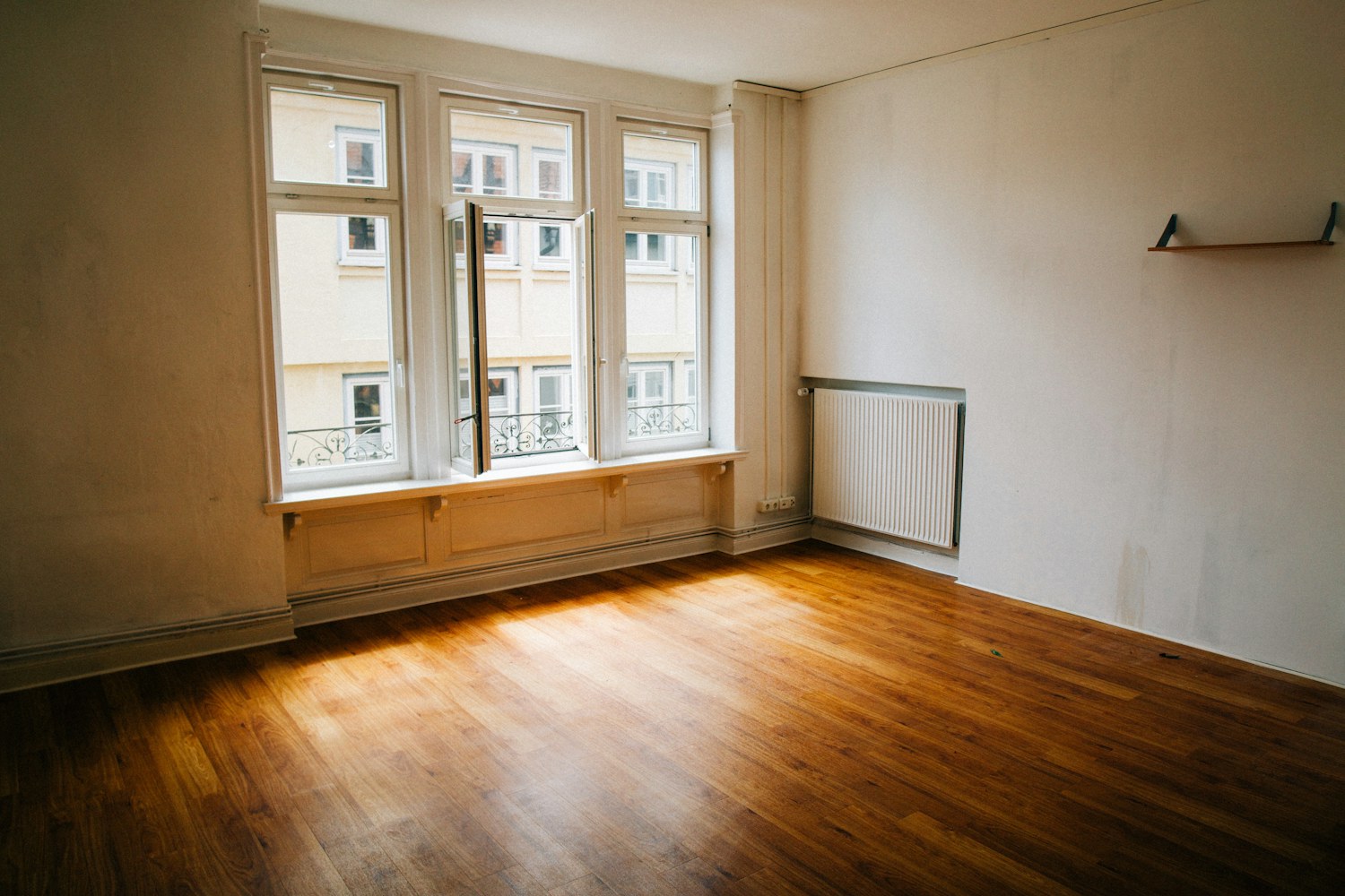 The room, emptied, the morning the keys changed hands