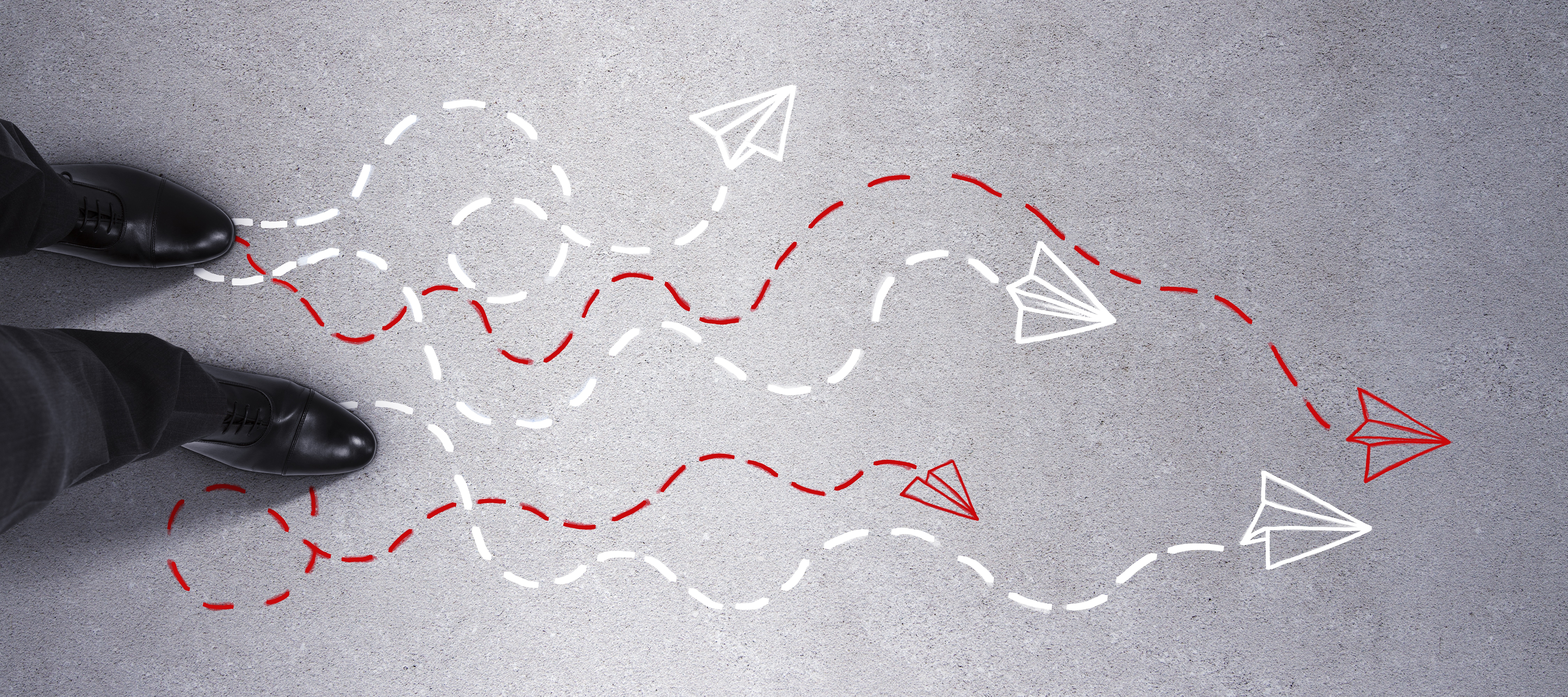 Diverging paths on a surface, symbolising multiple journeys and conversion routes in SaaS marketing companies.