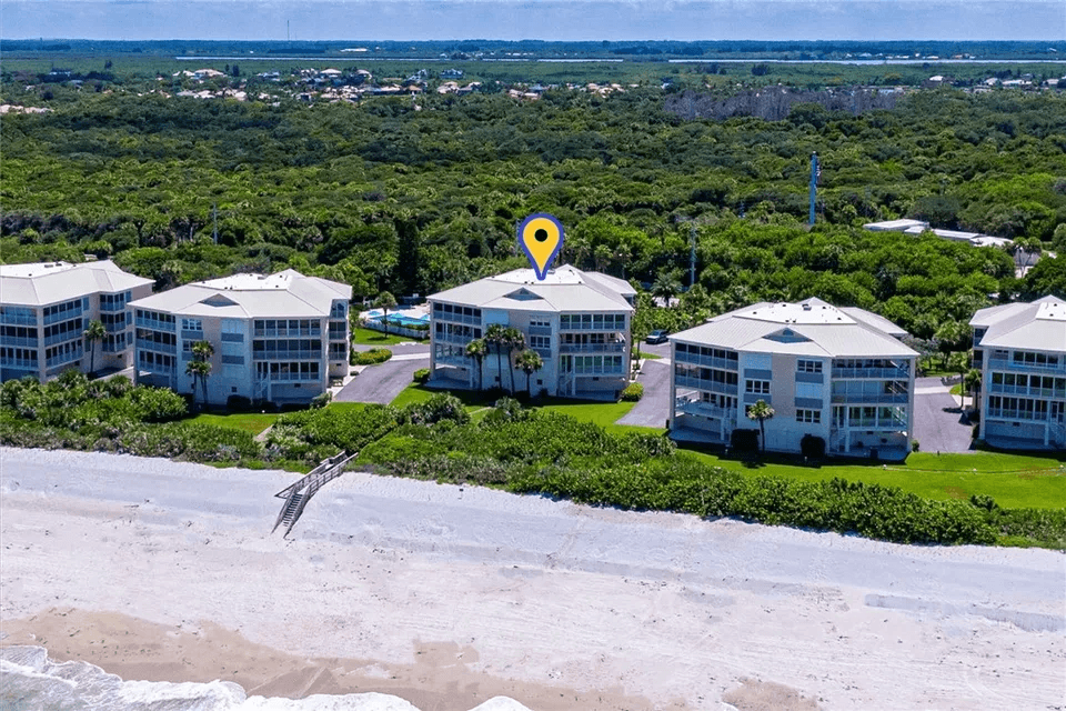 1998 New Roof Construction in Sea Oaks Beach Villas, Vero Beach with Entegra Flat Tile in White
