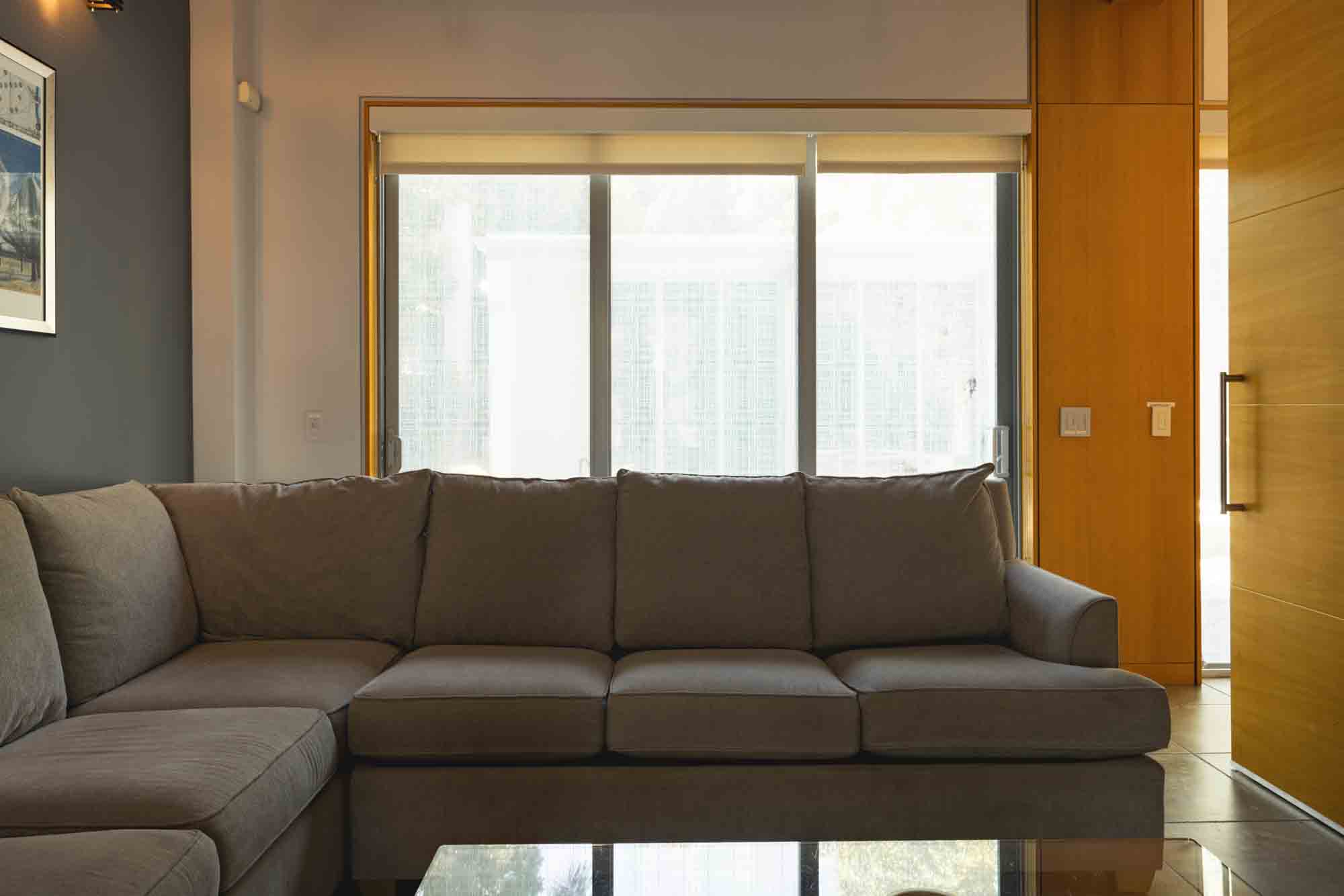 living area of Contra House showcasing modern Key West accommodations with sleek, mid-century design