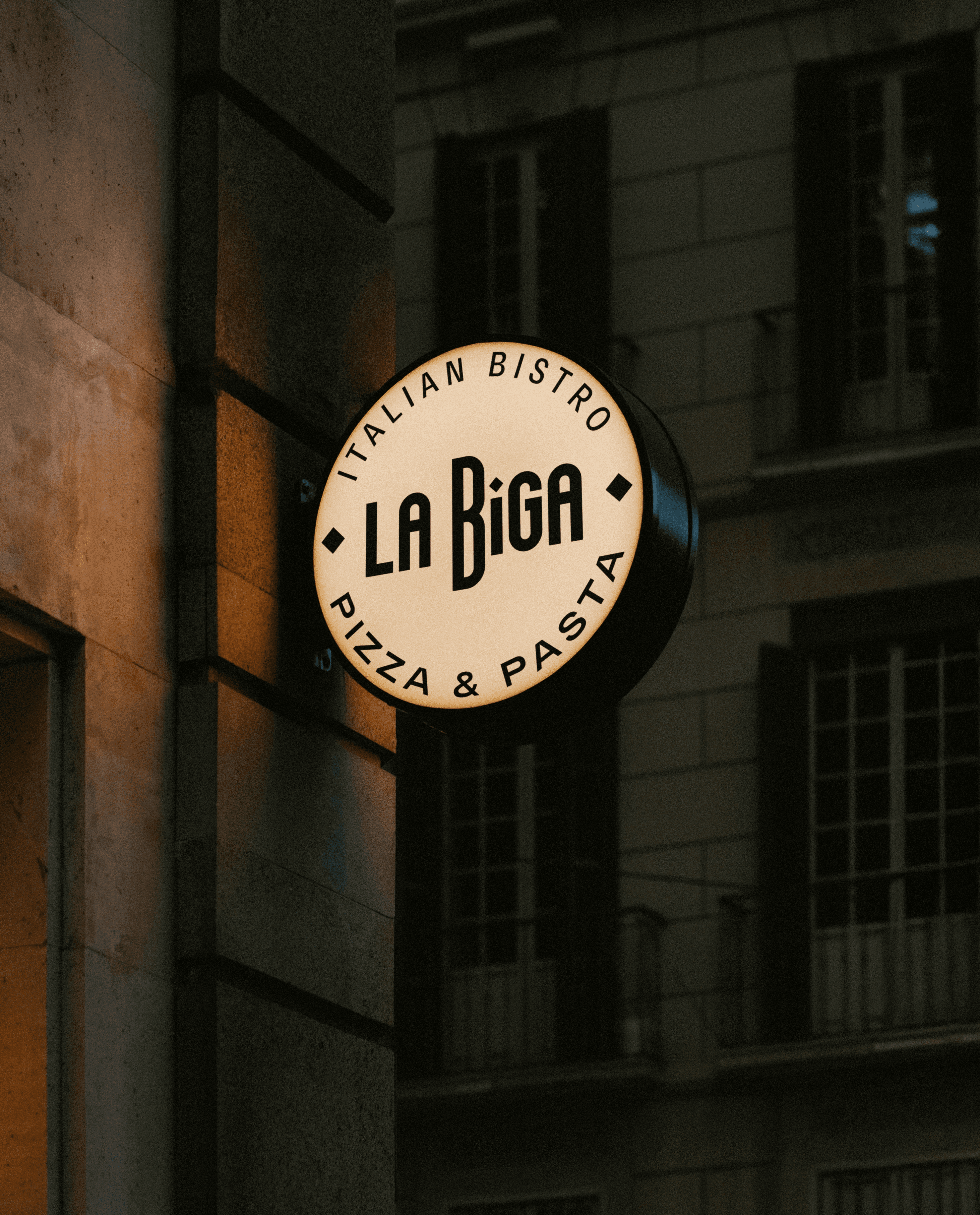 Streetside billboard with flyposters of the Batch.Works brand and illustrations