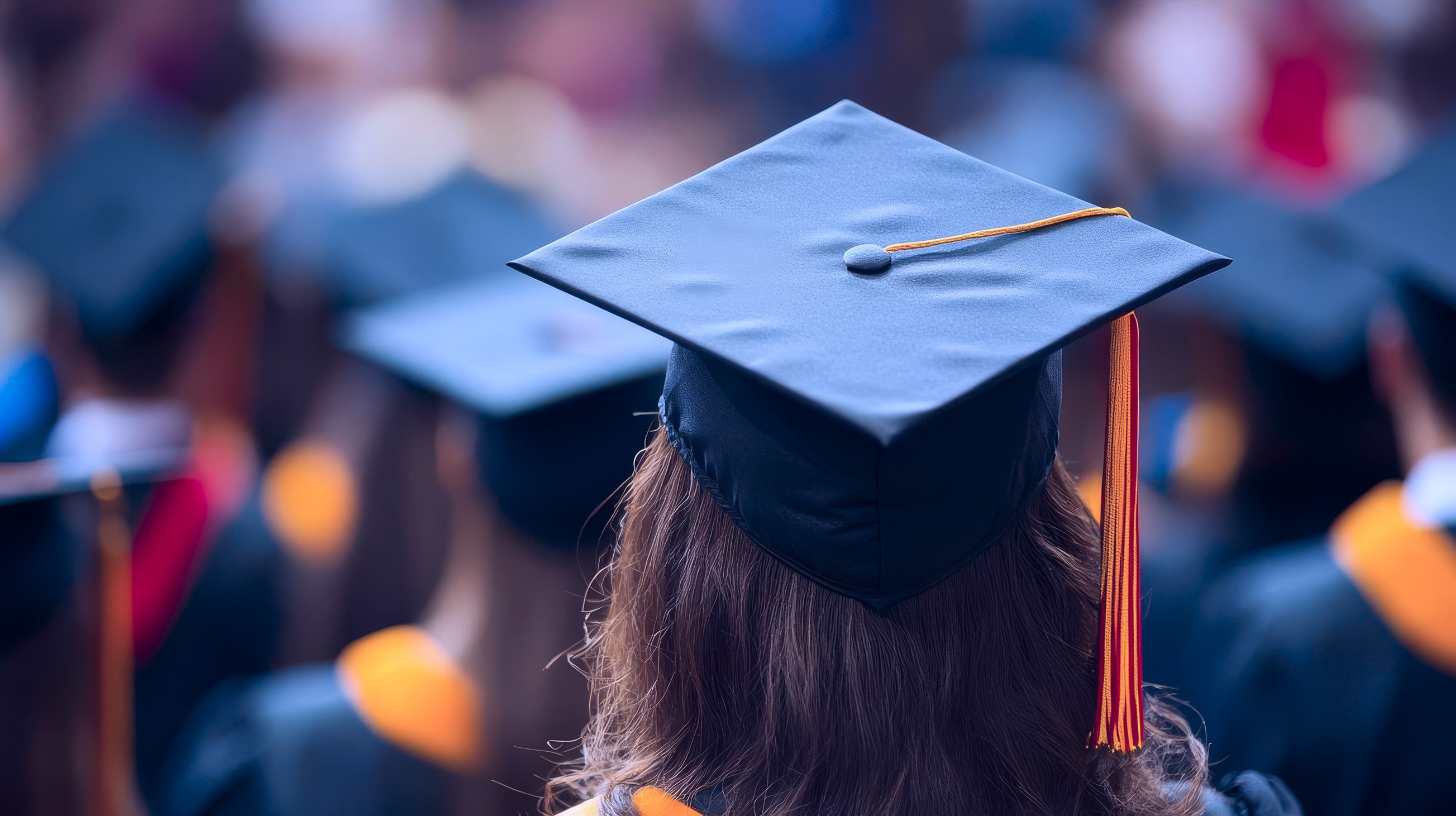 Photo of a woman wearing a mortarboard cap