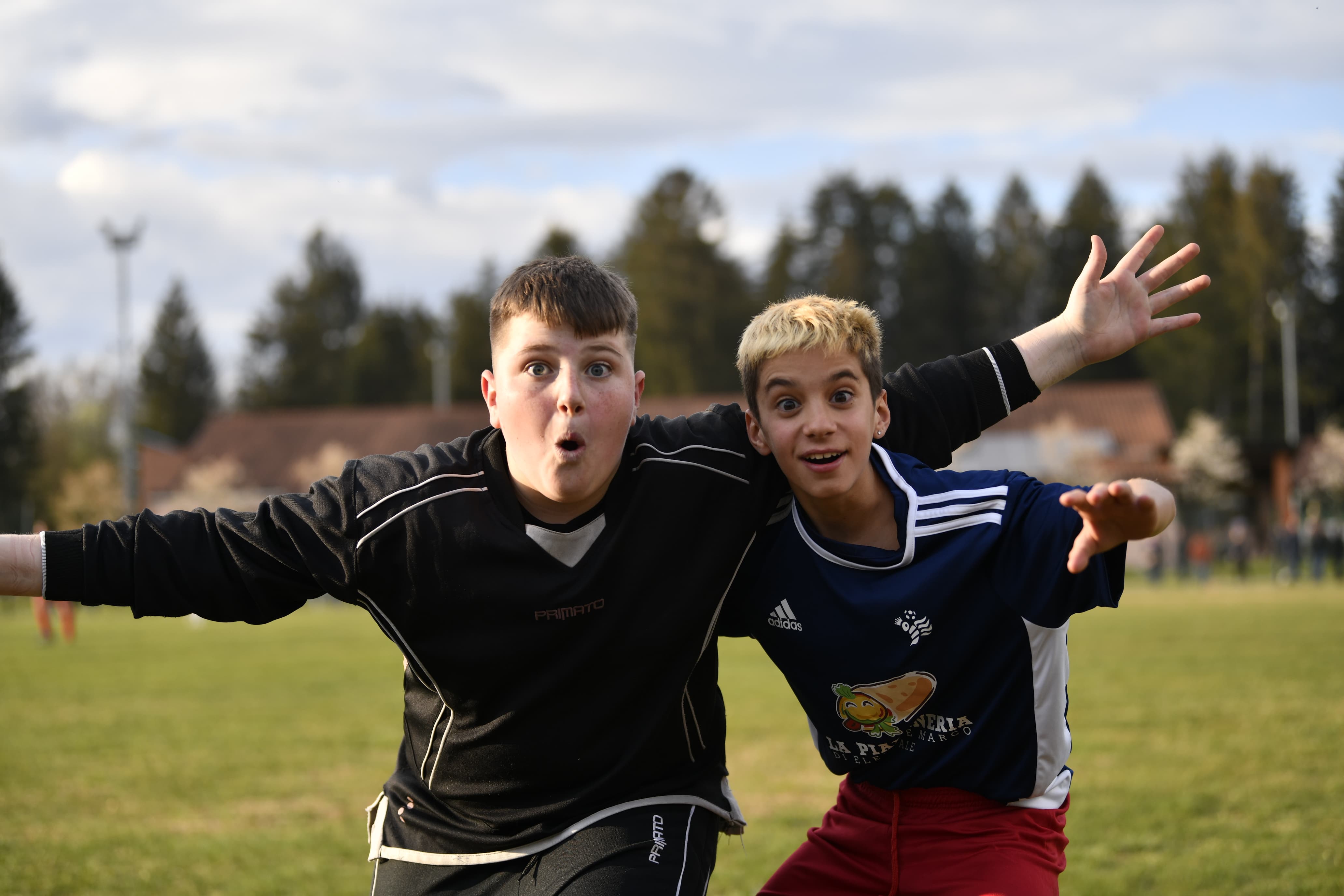 Two young kids playing soccer during match Pianeta Sport