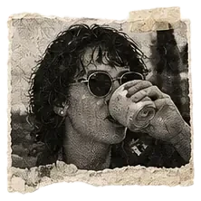 Person drinking a matcha latte.