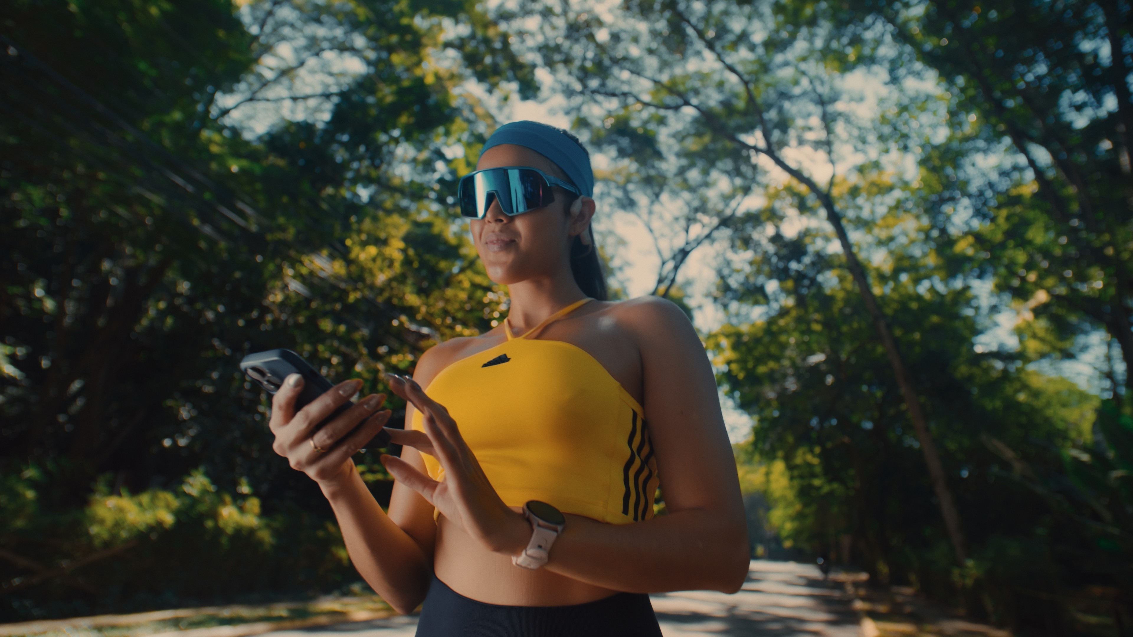 Person, holding a white rose behind his back with one arm on a light blue background