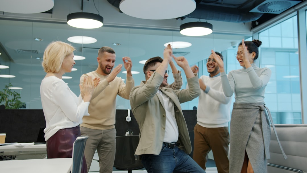 A successful business team celebrating digital growth