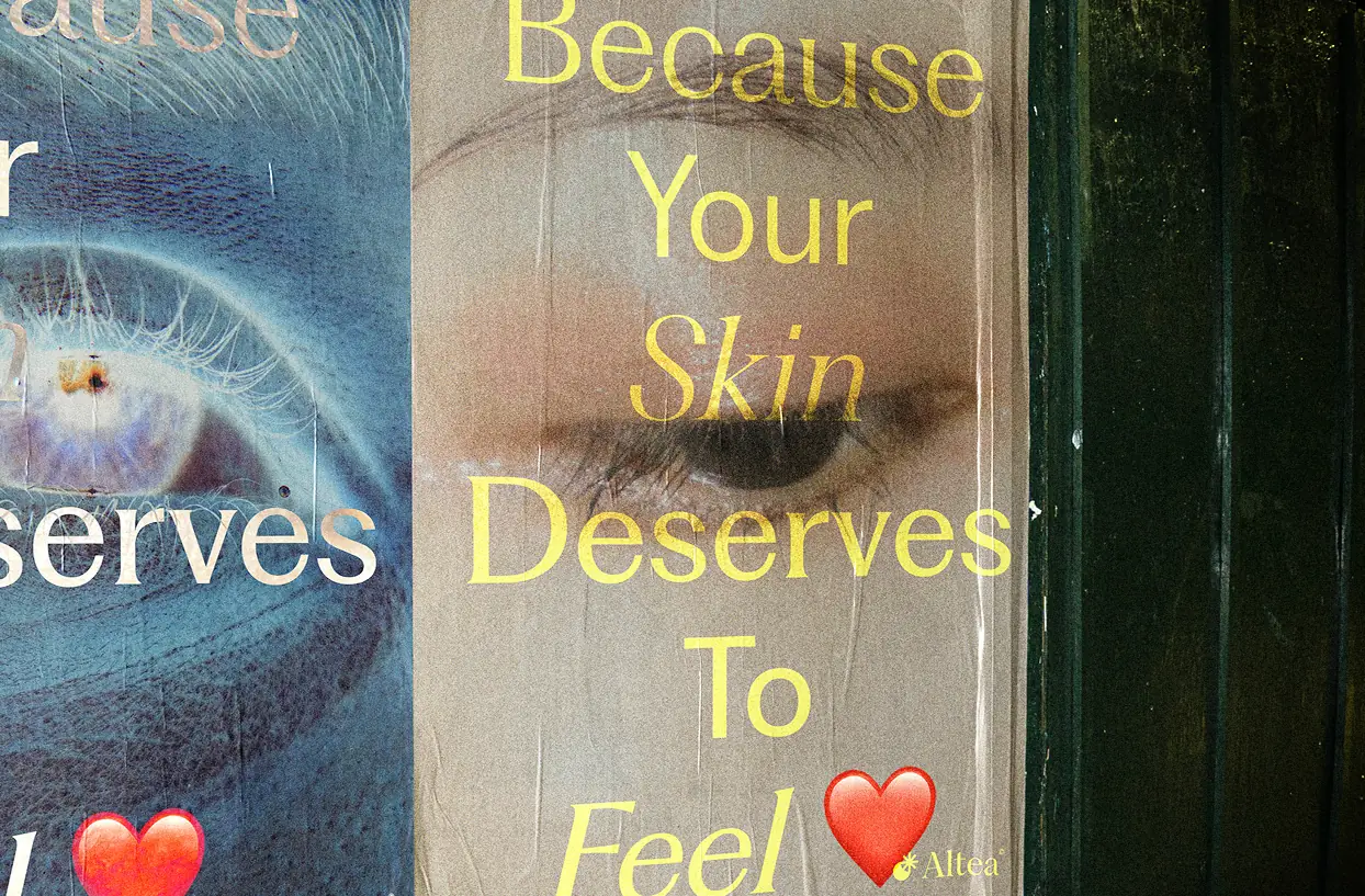 Altea poster with motivational skincare messaging and a close eye detail.