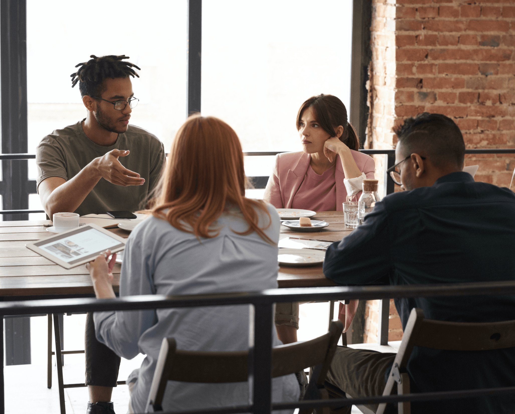 People at the meeting desk