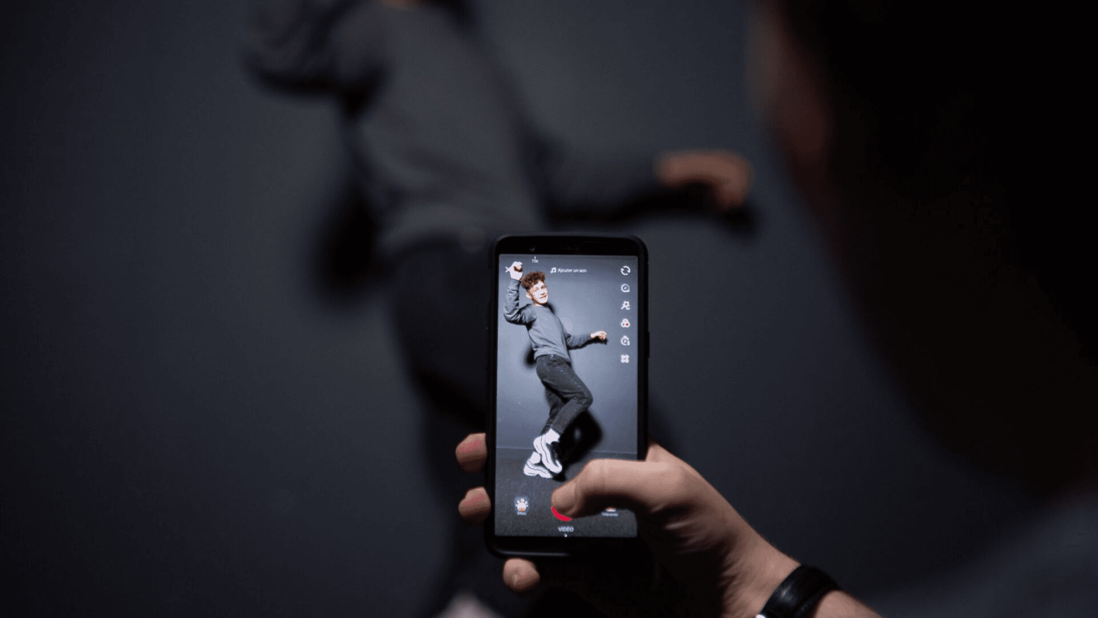 Person recording a dance video for TikTok - TikTok Content Ideas Without Showing Face