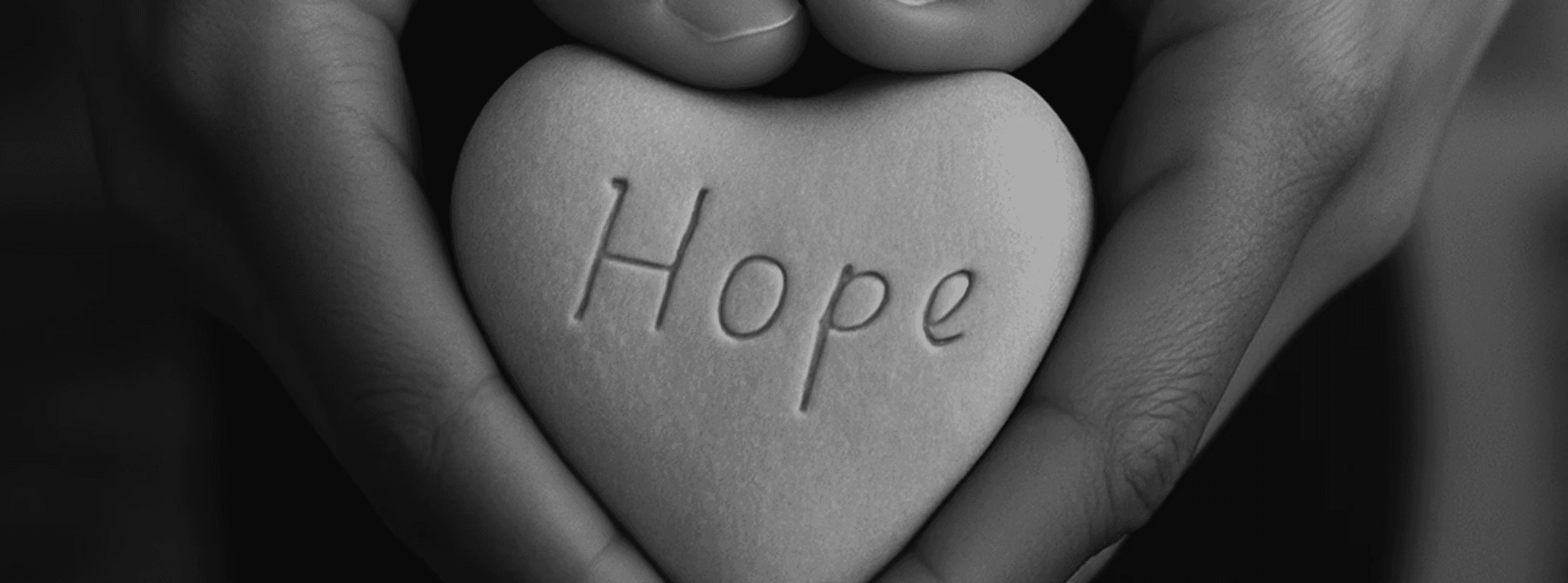 a black and white living room with a large tv