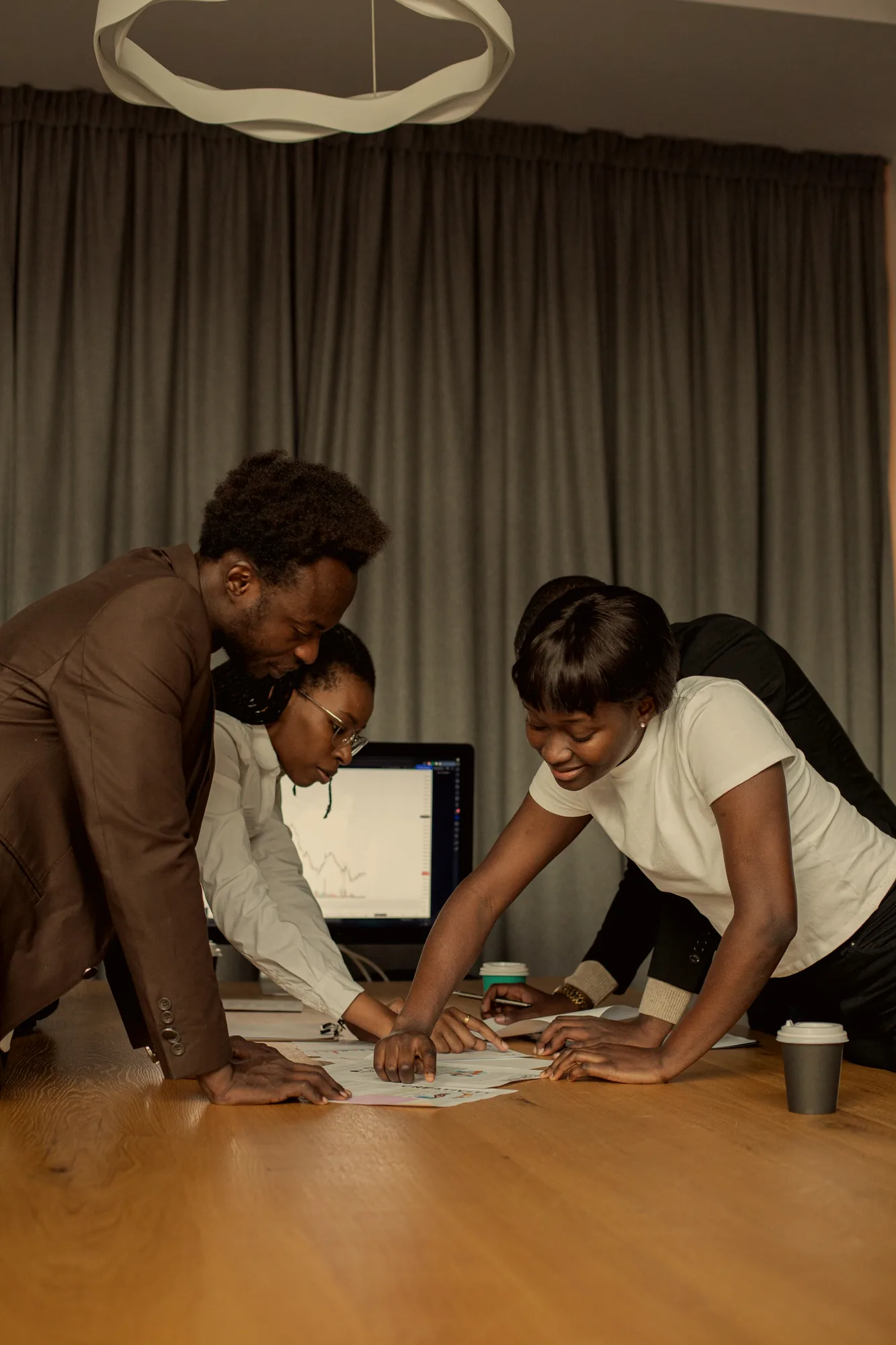 South African business team planning around a table
