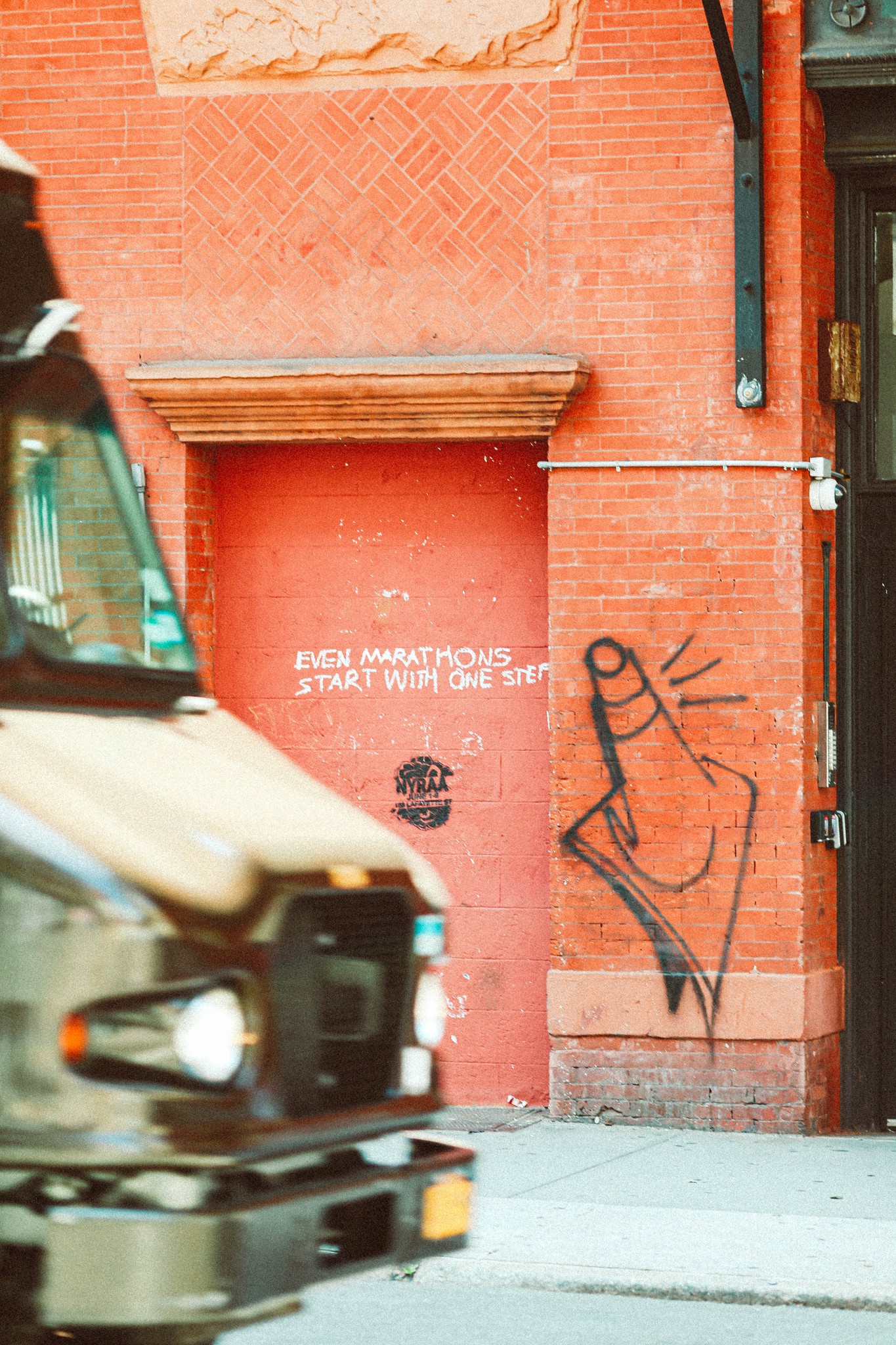 Interior of a cafe or workspace with several people at tables