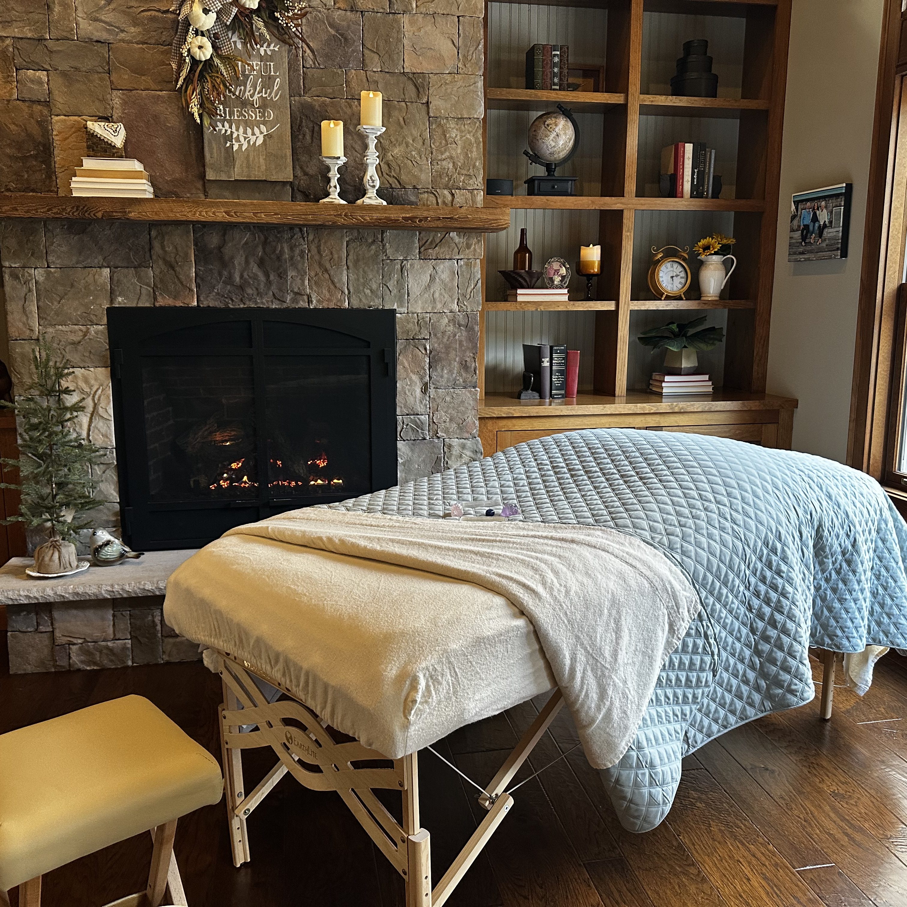 a group of bottles of essential oils sitting on a table