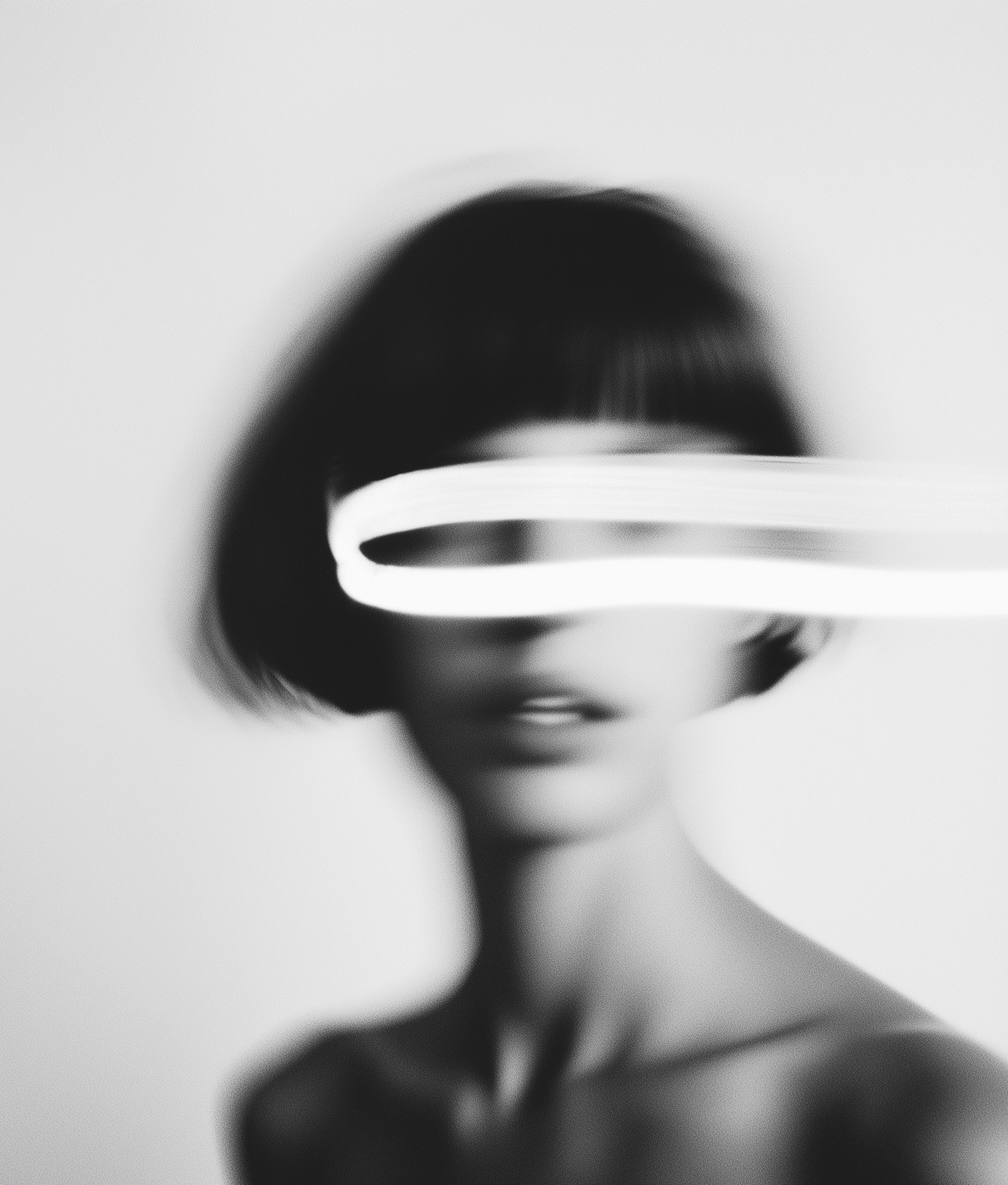 Woman with a blurred strip towards her face
