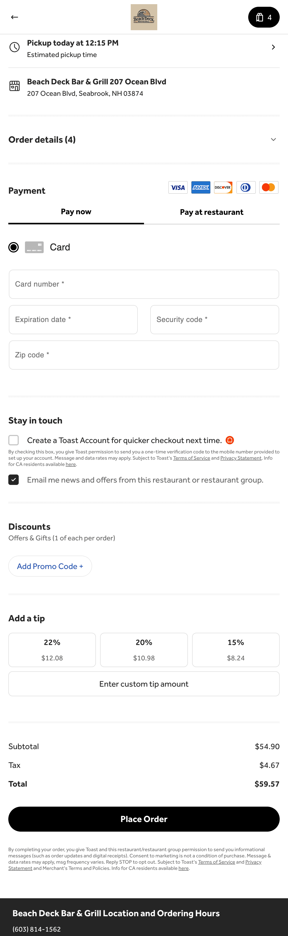 An elephant with large tusks in a lush green landscape.