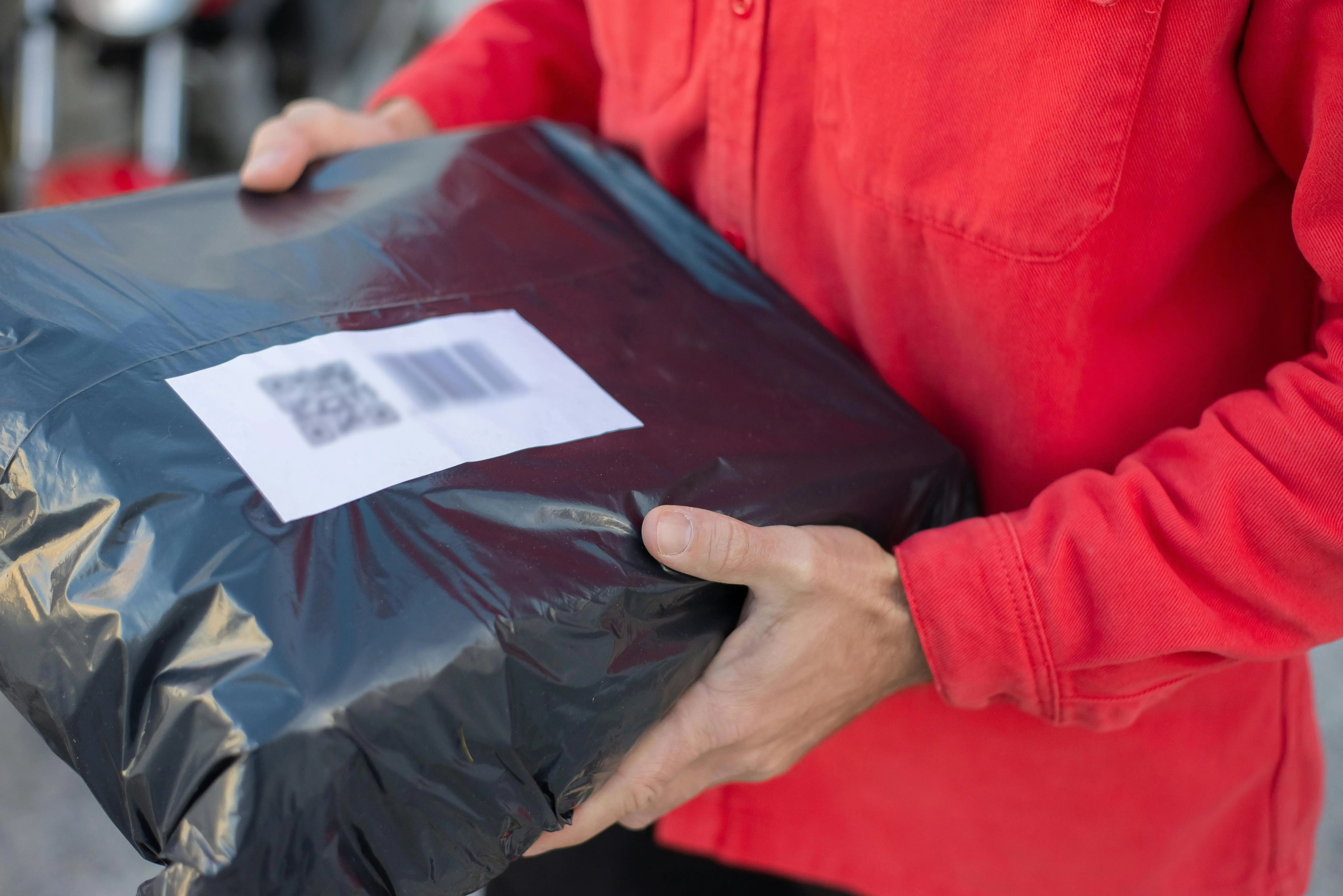 Warehouse team handling parcels during logistics operations