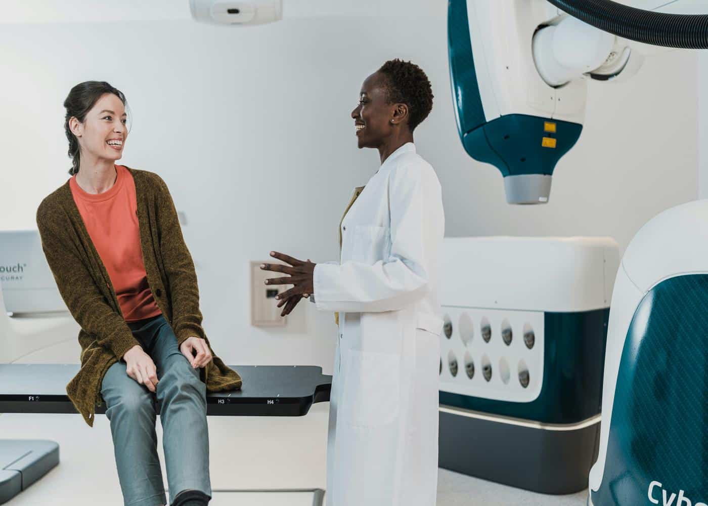 Doctor talking to a patient in a medical lab