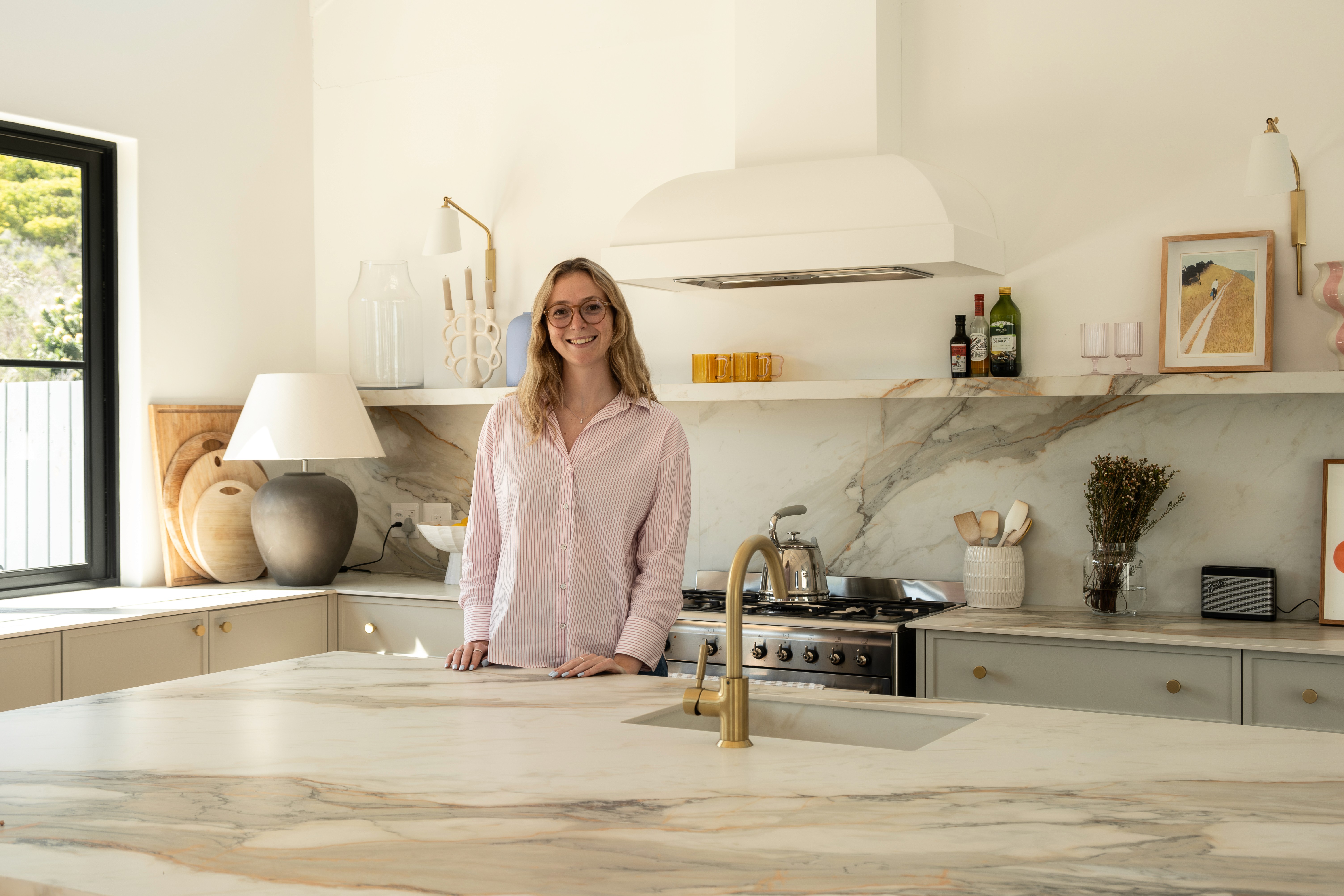 Modern curved staircase with warm ambient lighting
