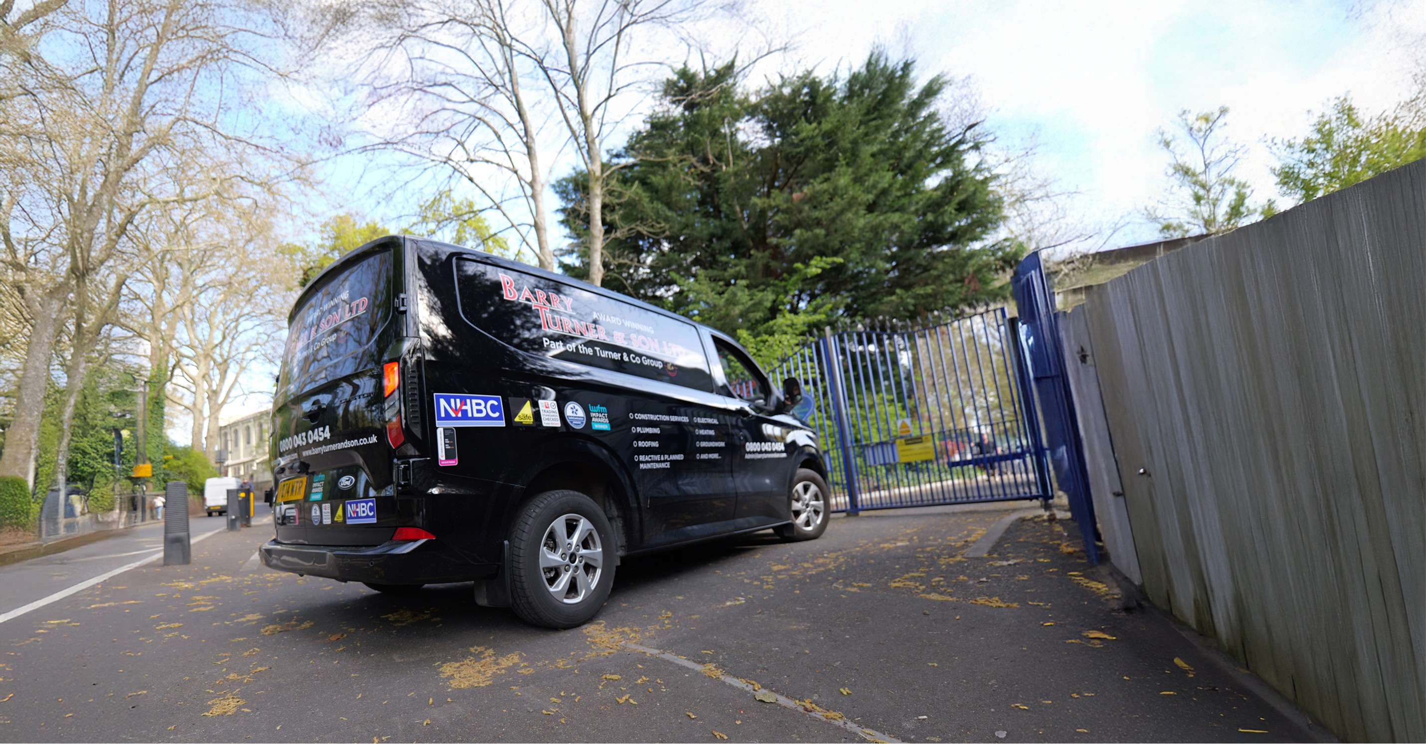 Barry Turner and Son electric van with credentials as stickers on the side of the van