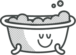 A cartoonish bath with a smiling face, filled with bubbles.