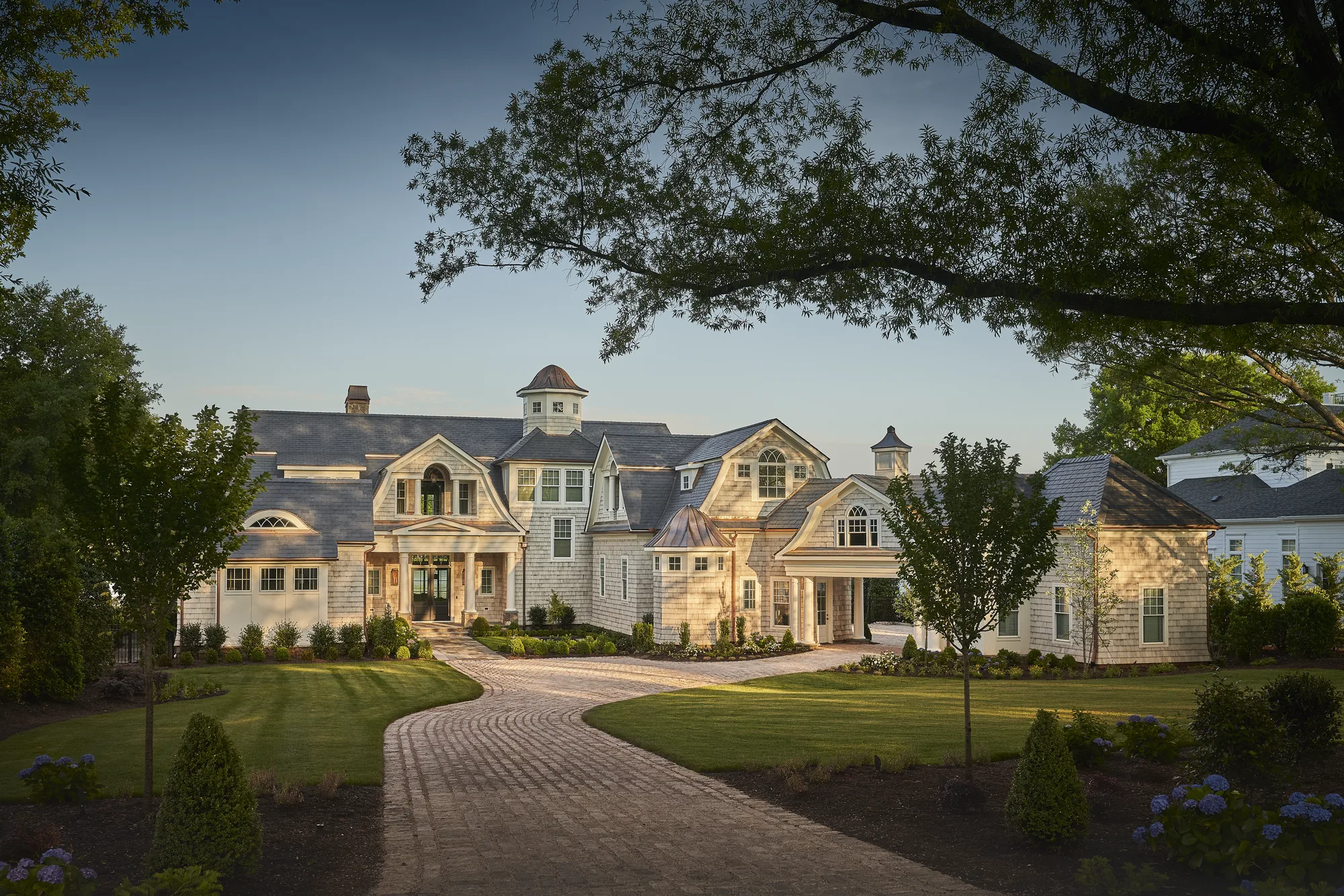 Shingle-style estate at golden hour, Lake Norman