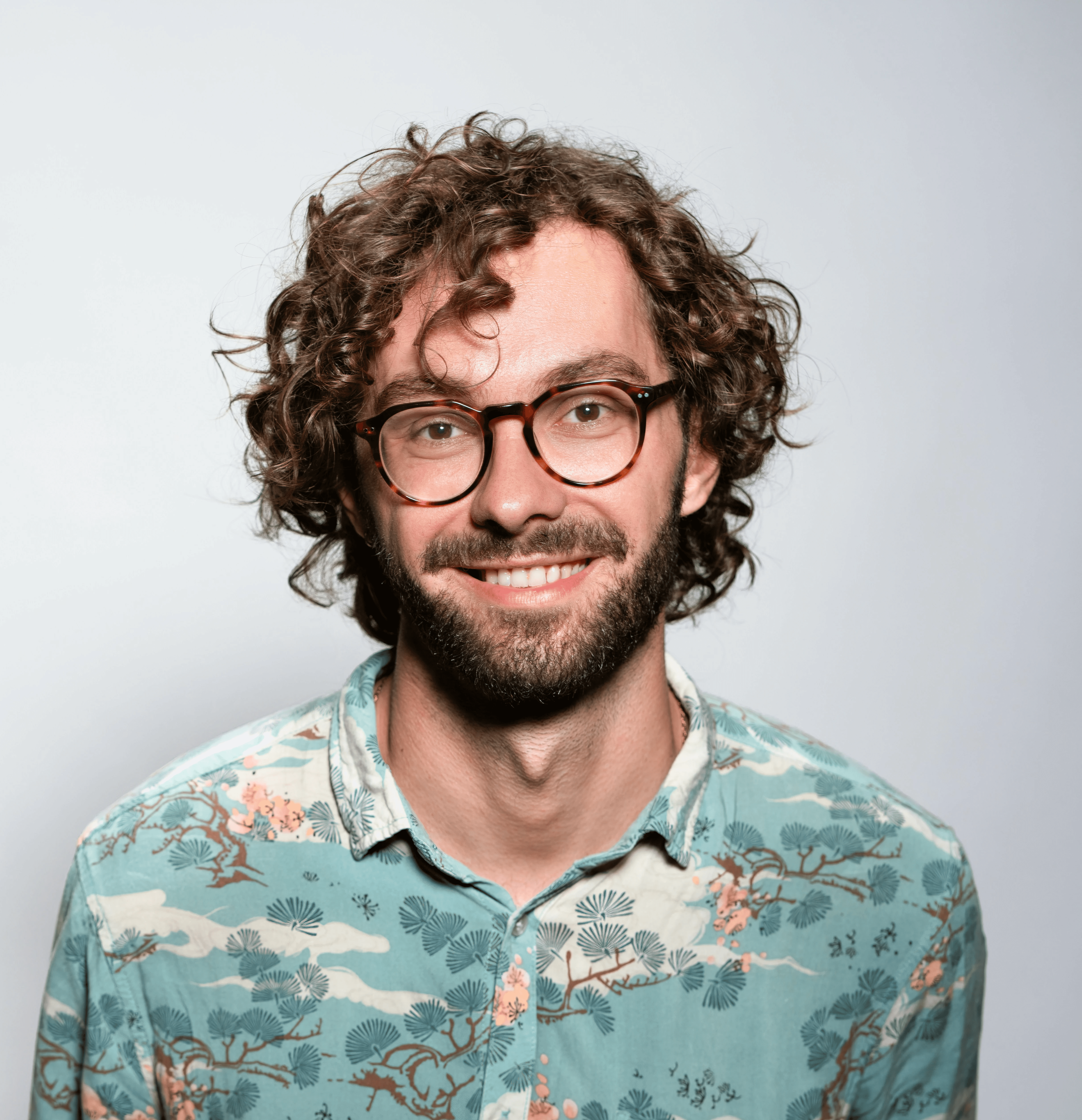 men's blue and white button-up collared top