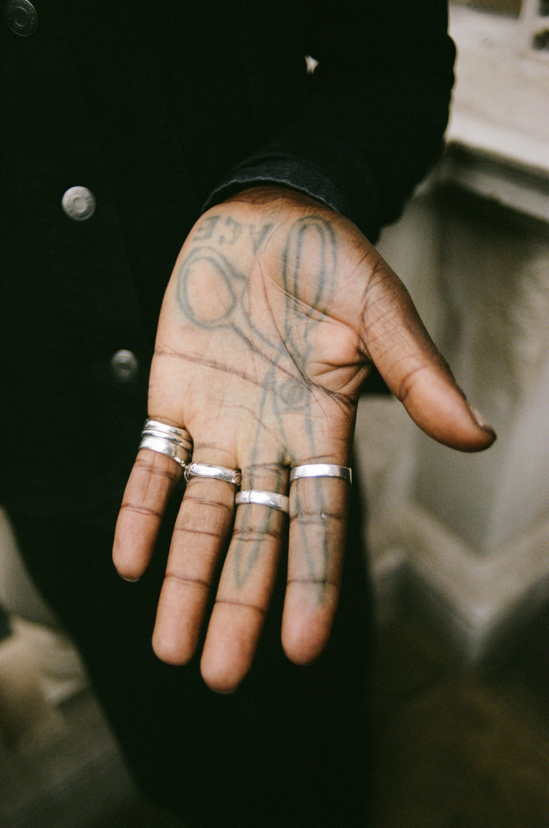 Woman with red hair covering mouth with hair