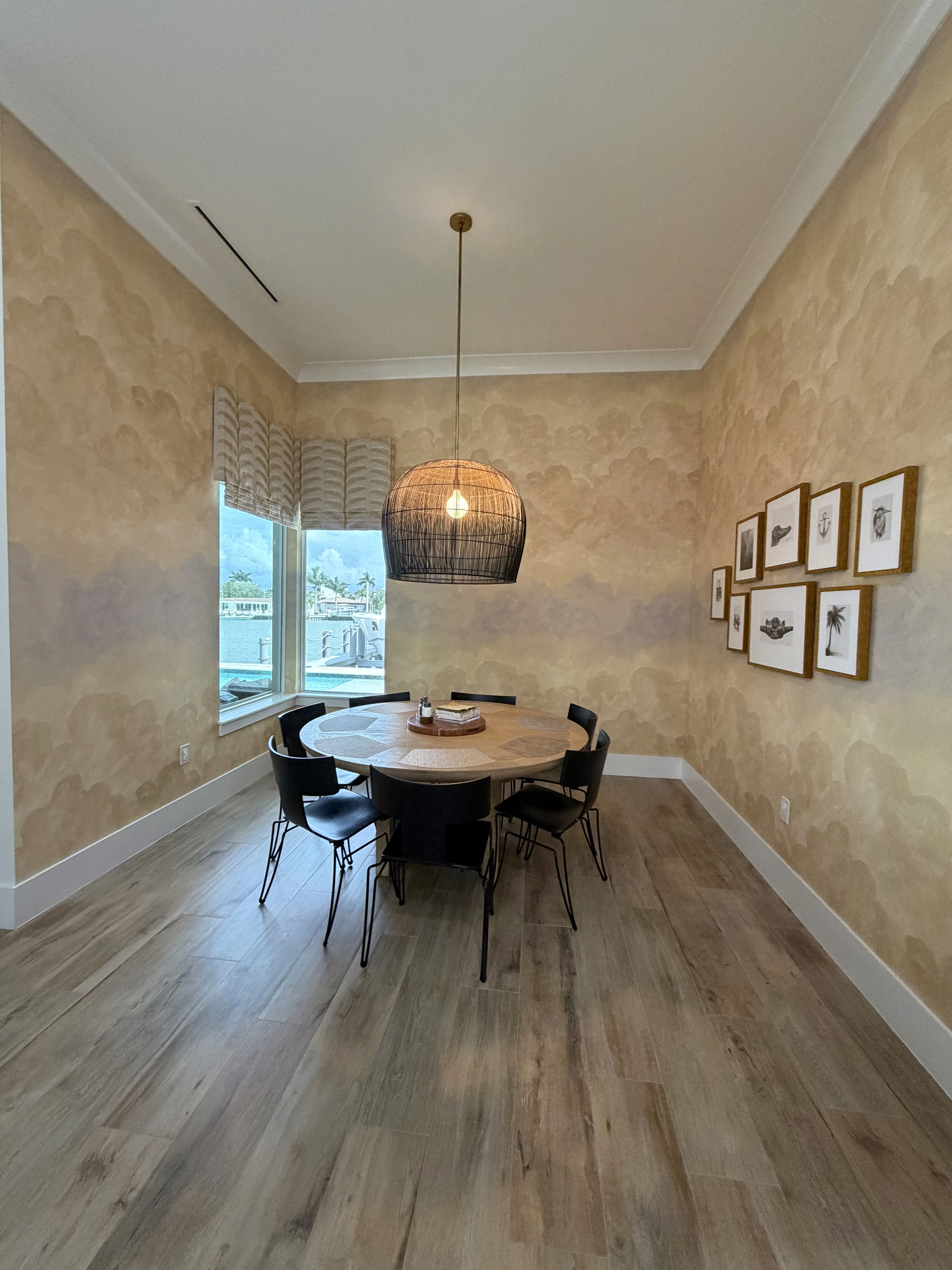 Dining room accent wall wallpaper installation in Southwest Florida home