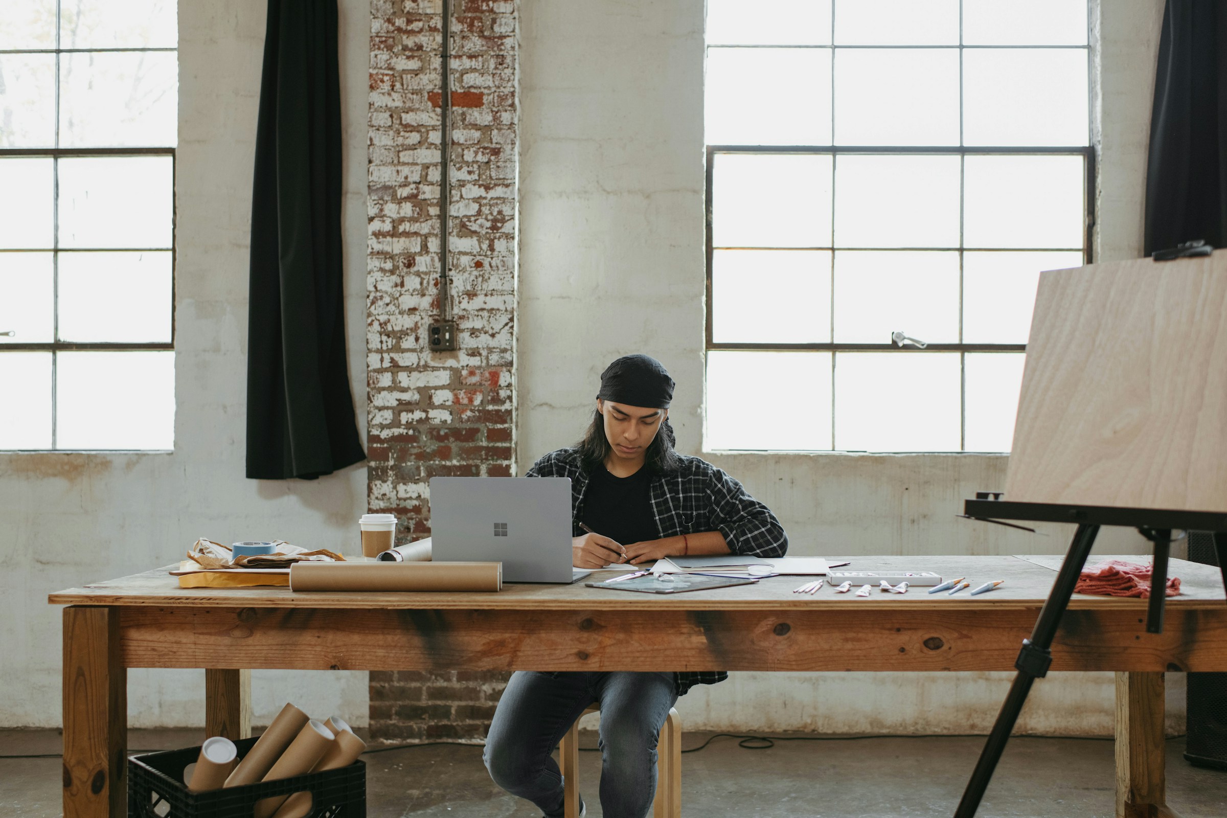 Man Working on Laptop - Content Creator Must-Haves