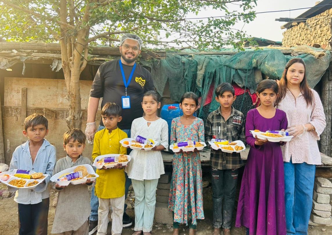 a black and white living room with a large tv