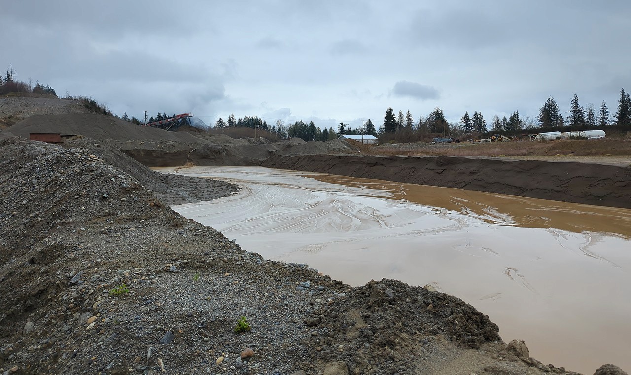 Settling pond with engineered slopes at Woodbrook Aggregates sand and gravel operation