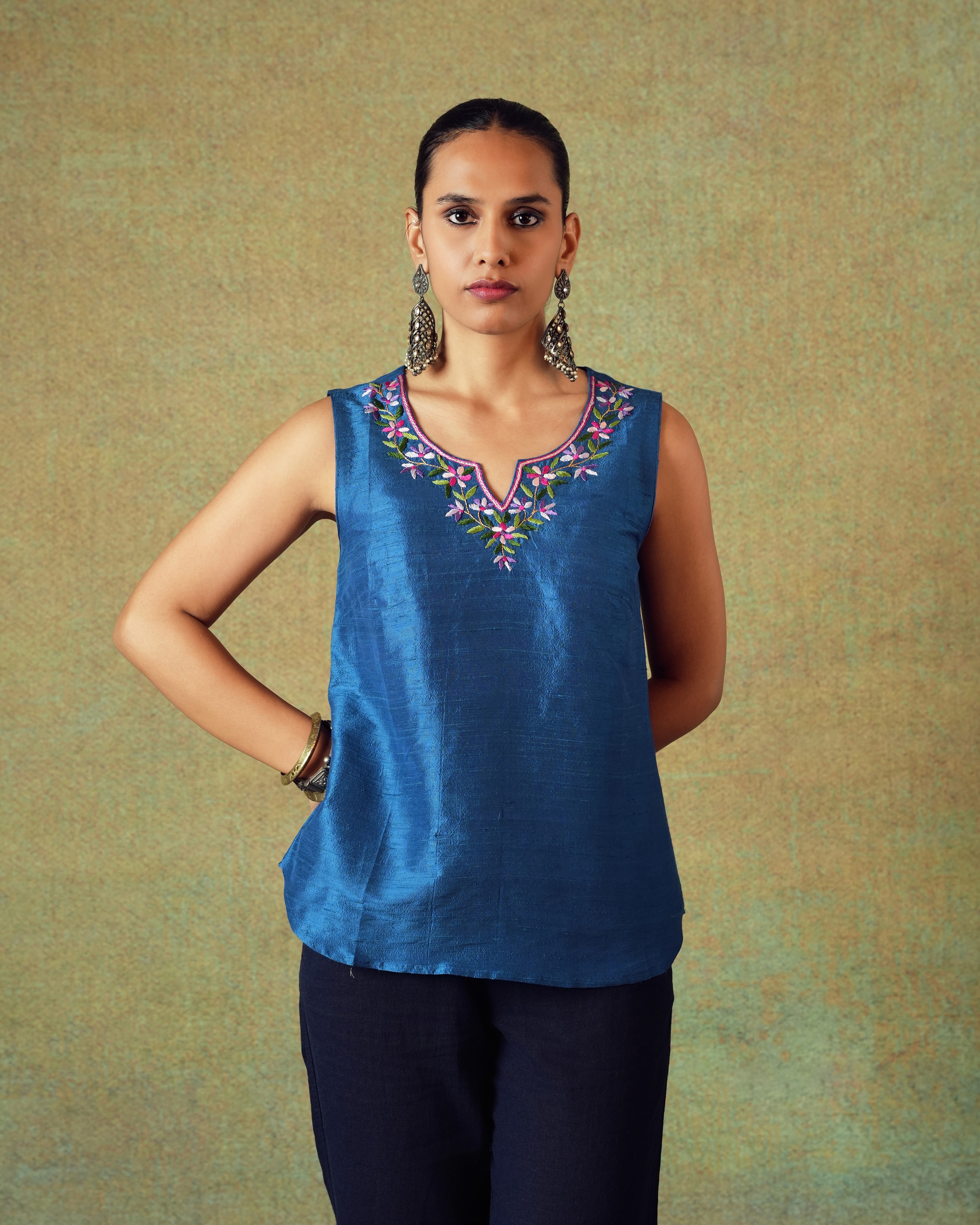 Friends laughing and posing inside a car