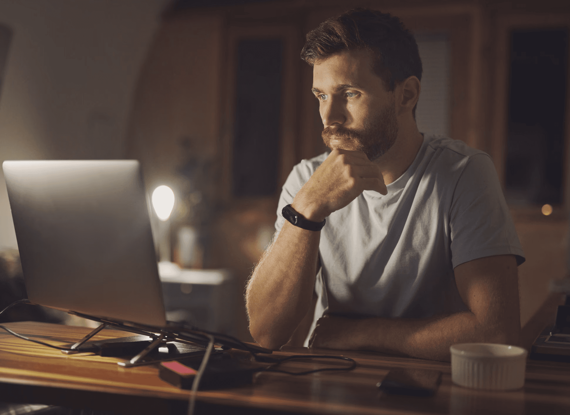 woman in yellow and blue jacket holding silver iphone 6