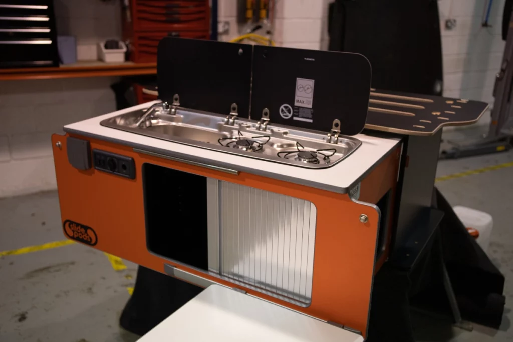 slidepod storage idea for small campervan conversion